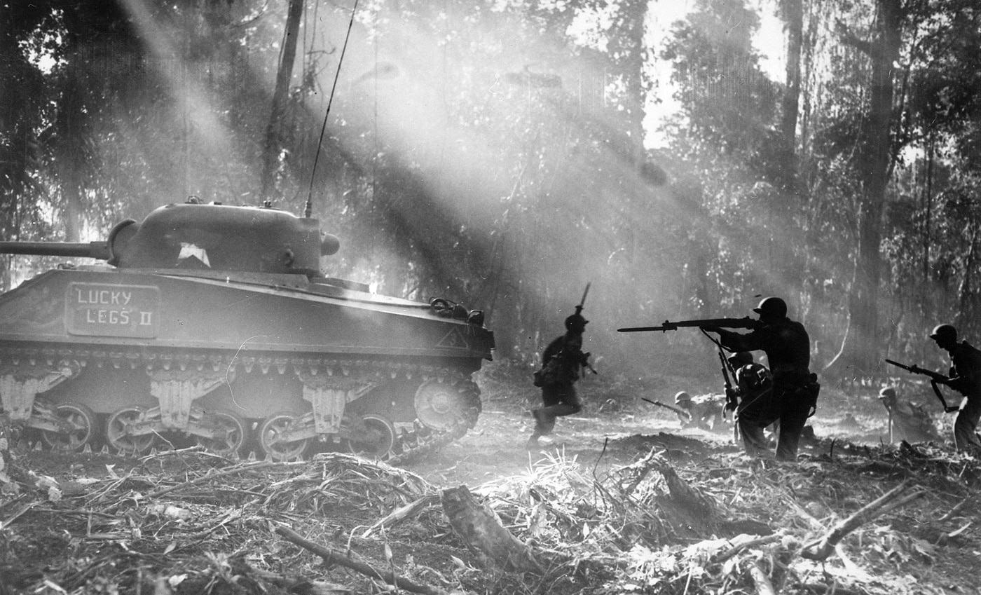 Sherman tank supports infantry Bougainville March 1944