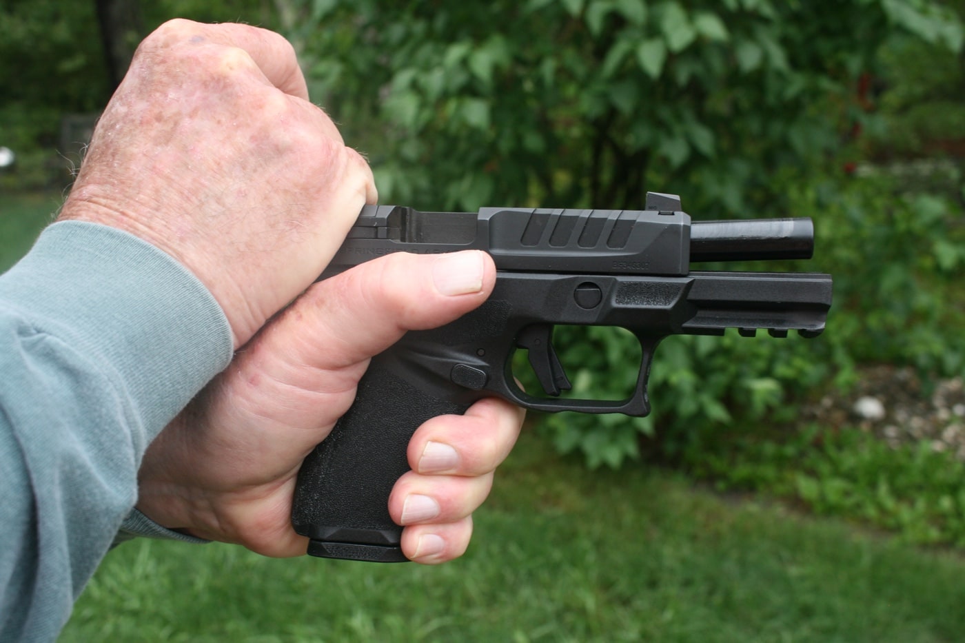 overhand grip on slide to reload