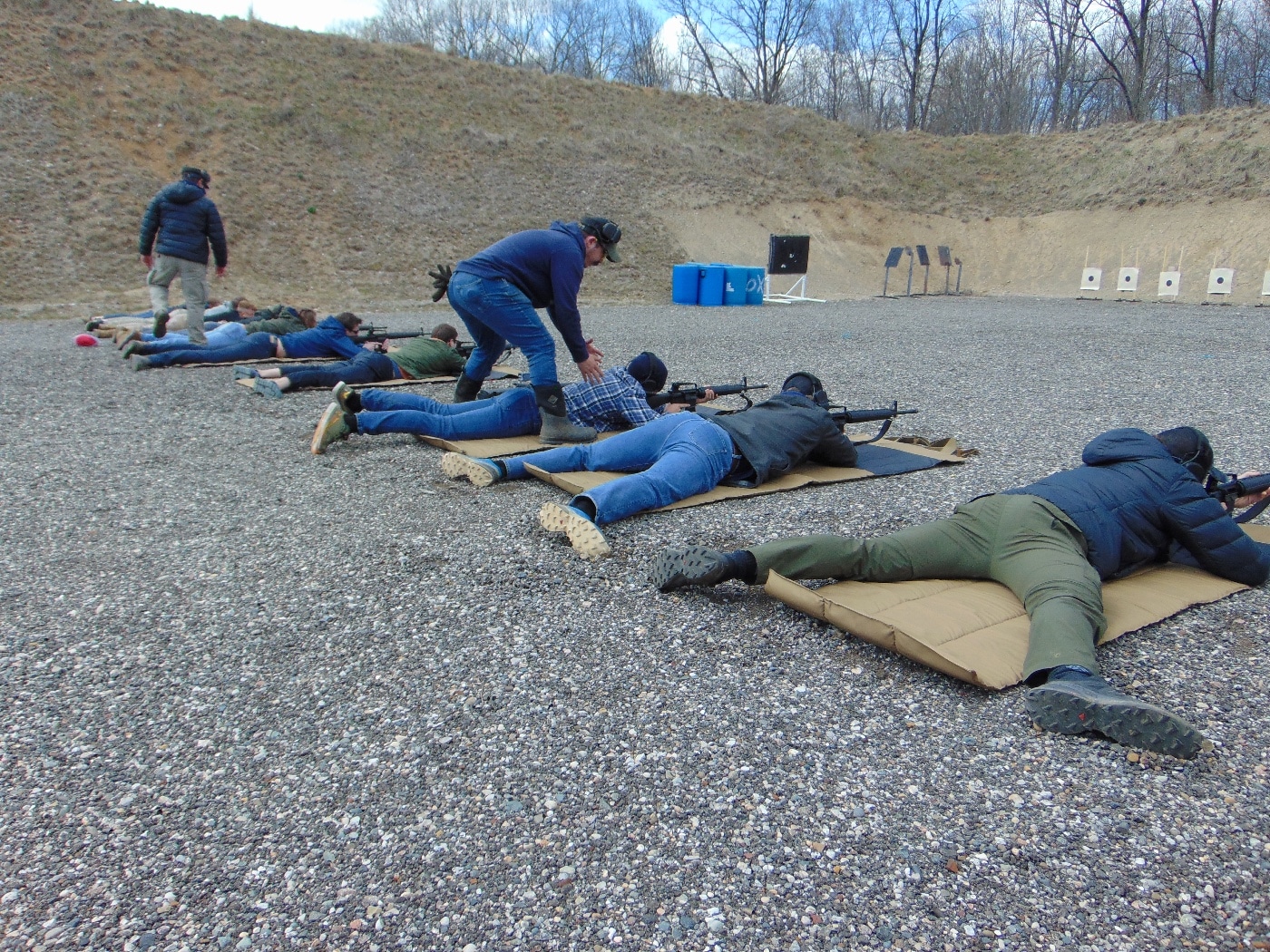 shooters with Springfield Armory SA-16 rifles at shooting range