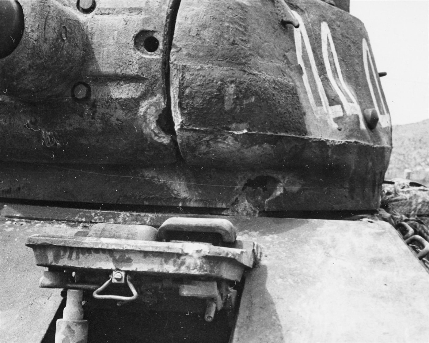 T-34-85 tank hit by a M4A3E8 Sherman tank