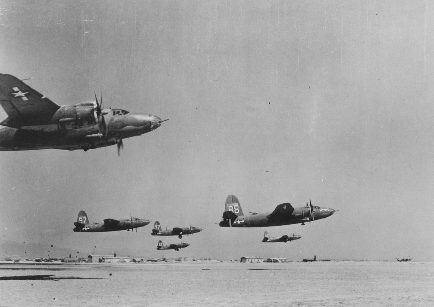 flight of Martin B-26 Marauder bombers take off from Africa