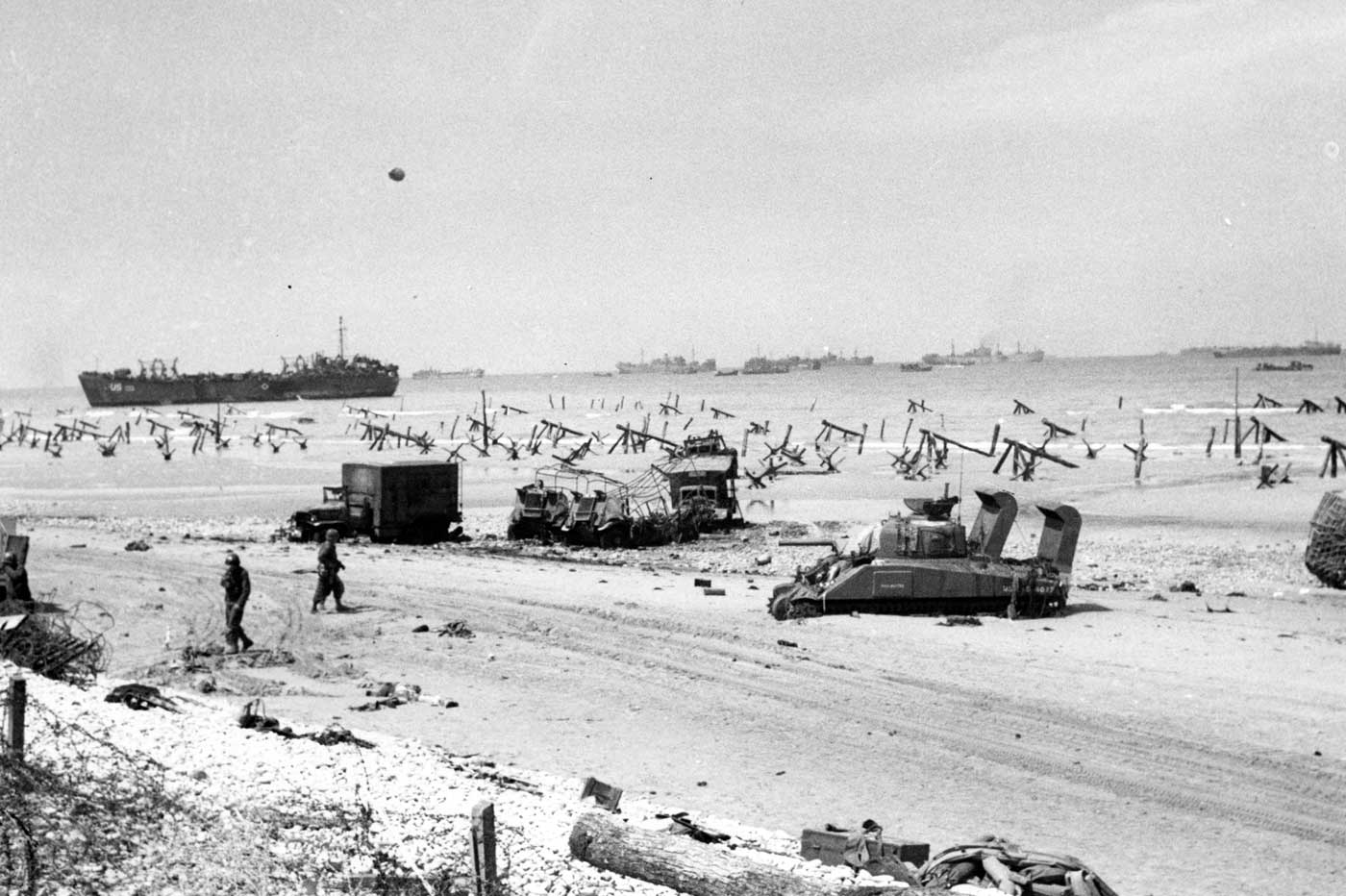 D-Day tank bogged down in sand DD Sherman