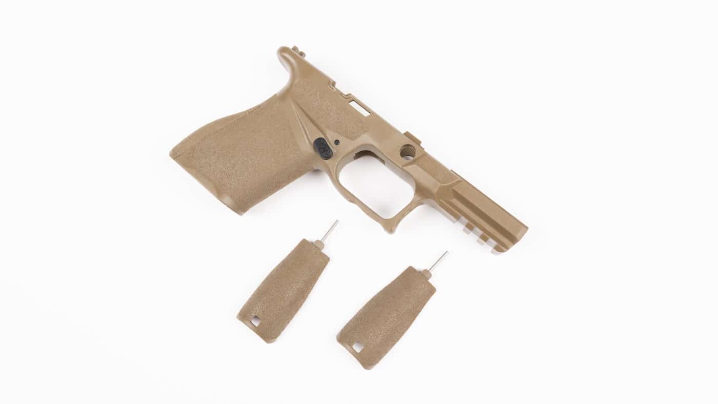 The image shows several Springfield Echelon 4.0C grip modules each paired with three removable, color-matched backstraps. The grip modules and their backstraps are arranged by size or color, allowing a clear view of how each backstrap matches its corresponding module. The photo highlights the textured surface and ergonomic shaping of both the grip modules and backstraps, designed to enhance comfort and control. The modules are displayed in various colors — black, OD green, and Desert FDE — with each backstrap perfectly matching the polymer finish. This setup demonstrates the level of customization available, as shooters can mix and match different backstrap sizes for a personalized fit. The background is plain, focusing attention on the components themselves. This image helps illustrate how the Echelon’s modular design extends beyond just the main grip frame to include multiple backstrap options.