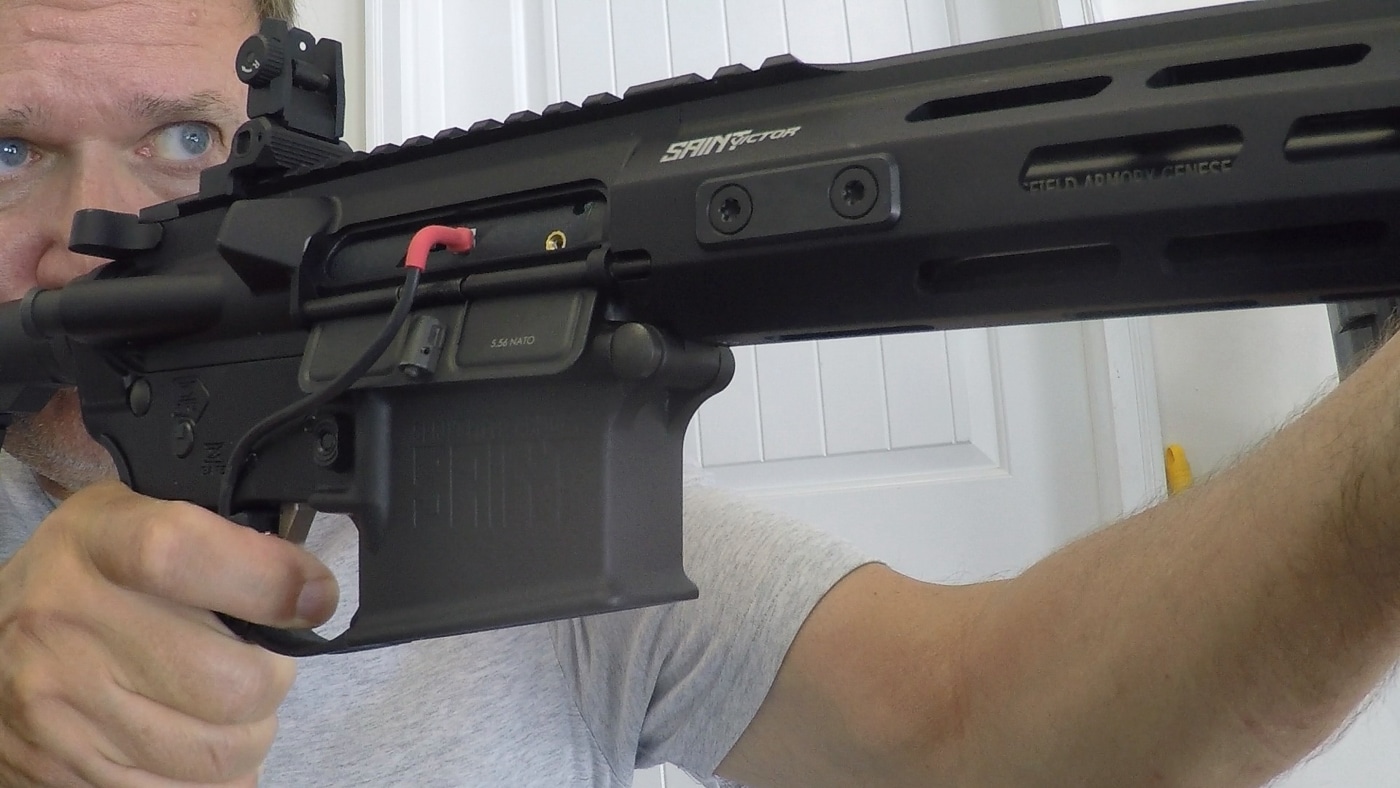 A Laser Ammo Flash Bolt dry-fire training system displayed alongside cost comparison figures for live ammunition. The Flash Bolt is a drop-in replacement for the AR15’s bolt carrier group and uses a laser to register hits on electronic targets. It allows thousands of trigger pulls on a single CR123 battery, eliminating the need for costly 5.56 NATO rounds during practice. Bulk ammunition prices can exceed $400 per 1,000 rounds, making the Flash Bolt a long-term money-saving option. The image emphasizes the financial advantage of regular at-home training without ammo purchases. It appeals to shooters focused on budget-friendly skill building.