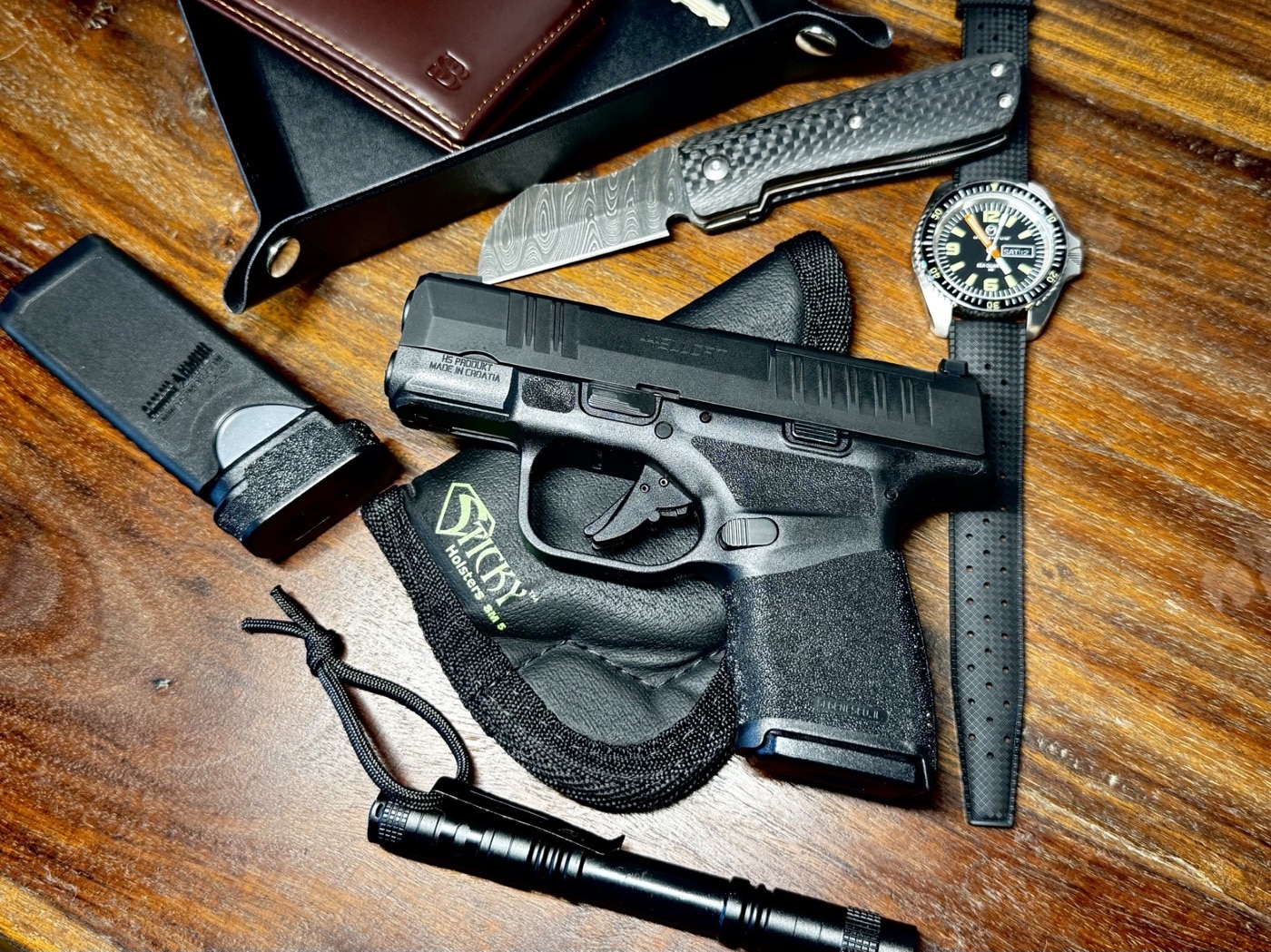 Springfield Armory Hellcat and other EDC tools carried by the author