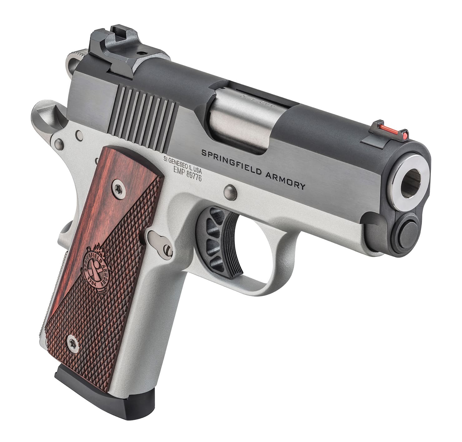This photo features the Springfield Armory Ronin EMP 1911 compact pistol. The handgun is a reduced-size 1911 chambered in 9mm, designed for concealed carry and everyday use. It retains the classic 1911 design elements such as the grip safety, thumb safety, and crisp single-action trigger. The Ronin EMP has a shorter barrel and slim grip frame compared to a standard government model. Its two-tone finish and checkered grips give it a distinctive appearance while maintaining functionality. The pistol’s lightweight build and compact dimensions make it easier to carry than a full-size .45 ACP model. The image highlights the adaptability of the 1911 design to different sizes and calibers.