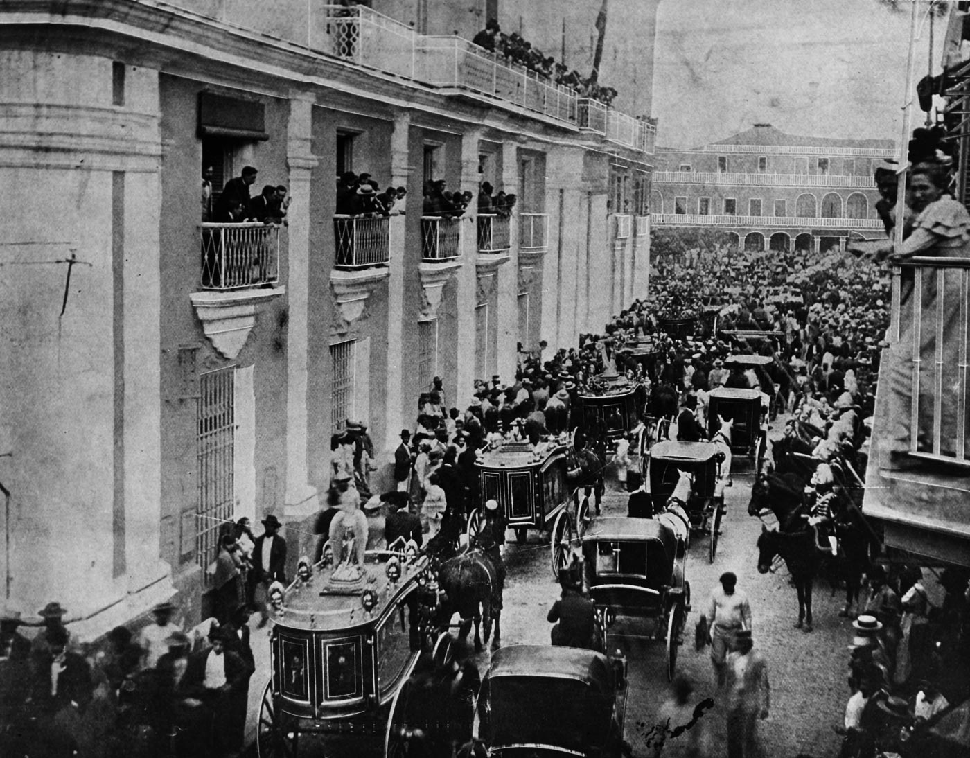 A solemn funeral procession for sailors killed in the USS Maine explosion in 1898. Rows of coffins draped in American flags are carried on caissons, accompanied by uniformed military personnel. Large crowds of civilians line the streets, many watching silently as the cortege passes by. The atmosphere is heavy with mourning, underscoring the national grief after the Havana Harbor tragedy. The procession demonstrates the respect given to the sailors who lost their lives. It also reflected the growing anger in the United States over the event. The image remains one of the most powerful visual reminders of the disaster’s human toll.