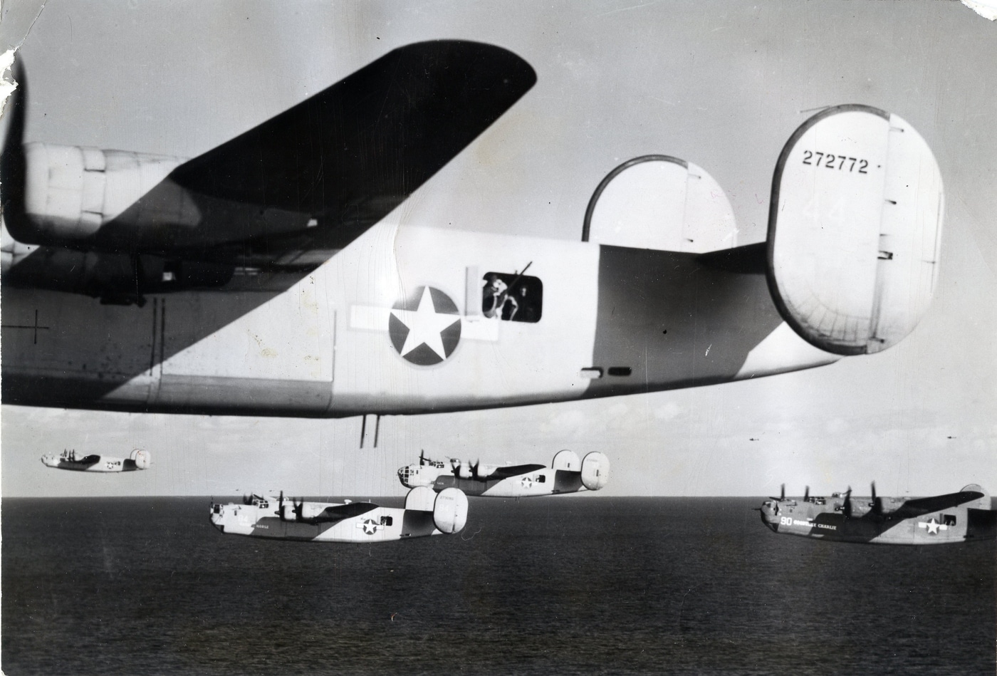 A formation of Consolidated B-24D Liberator bombers flies low over the Mediterranean Sea in August 1943. The heavy bombers maintain tight formation just above the water’s surface, a tactic used to avoid radar detection and improve bombing accuracy. Reflections of the aircraft are visible on the sea below, emphasizing their dangerously low altitude. Missions like these were part of the Mediterranean campaign against Axis airfields, supply depots, and oil facilities. Low-level flight increased vulnerability to anti-aircraft fire and mechanical failure but was seen as necessary for certain strategic targets. The B-24D’s long range made such missions possible, striking targets across southern Europe. This photograph captures the intensity and risk of Allied low-level bombing operations in World War II.
