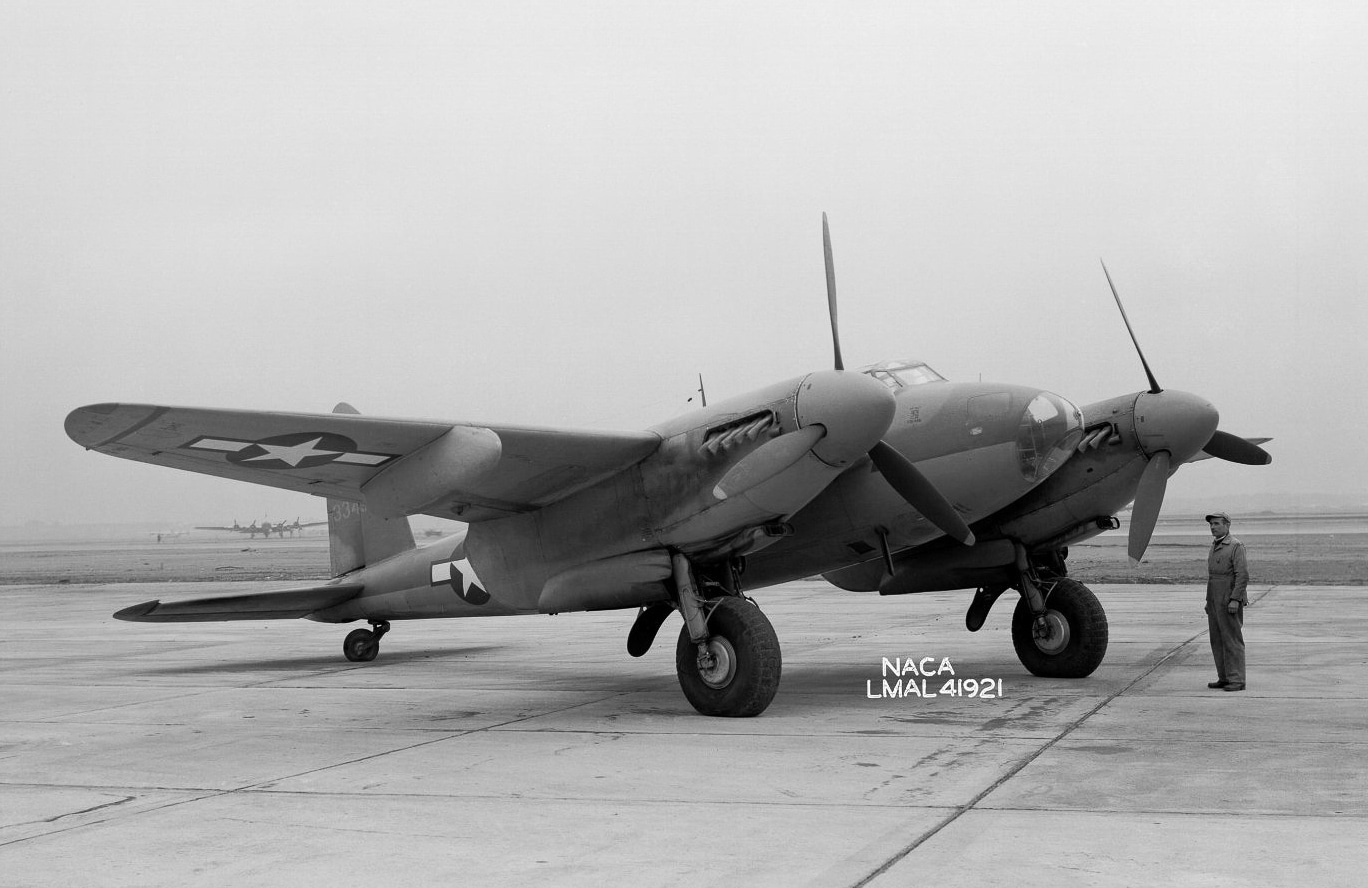 A de Havilland F-8 Mosquito aircraft photographed in flight during testing at Langley Research Center, piloted by NACA test pilot Bill Gray. The aircraft is seen against a clear sky, highlighting its twin-engine configuration and streamlined wooden airframe. Unlike its wartime combat missions, this Mosquito was used for research into longitudinal stability and control. The F-8 designation was applied to a small number of Mosquitoes evaluated by NACA after World War II. These trials provided valuable aerodynamic data that influenced later high-speed aircraft design. The photo emphasizes the clean lines of the Mosquito and its adaptability as both a combat aircraft and a research platform. It reflects the transition from wartime aviation to the scientific study of flight performance.
