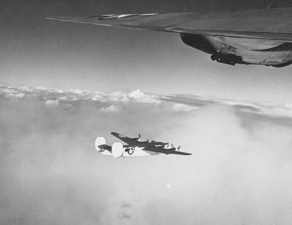 A U.S. Navy Consolidated PB4Y-1 Liberator patrol bomber is shown flying over the Bay of Biscay during World War II. The aircraft is on a maritime patrol mission, searching for German U-boats that operated heavily in the area. Below, the waters of the Atlantic are visible, stretching across the horizon. The PB4Y-1 carried radar and depth charges, allowing it to detect and attack submarines surfacing to recharge batteries. These patrols were crucial in reducing Allied shipping losses and closing the mid-ocean gap where convoys were previously vulnerable. The photo emphasizes the endurance of the aircraft, capable of flying long hours over open sea. It highlights the Navy’s reliance on adapted heavy bombers for anti-submarine warfare.