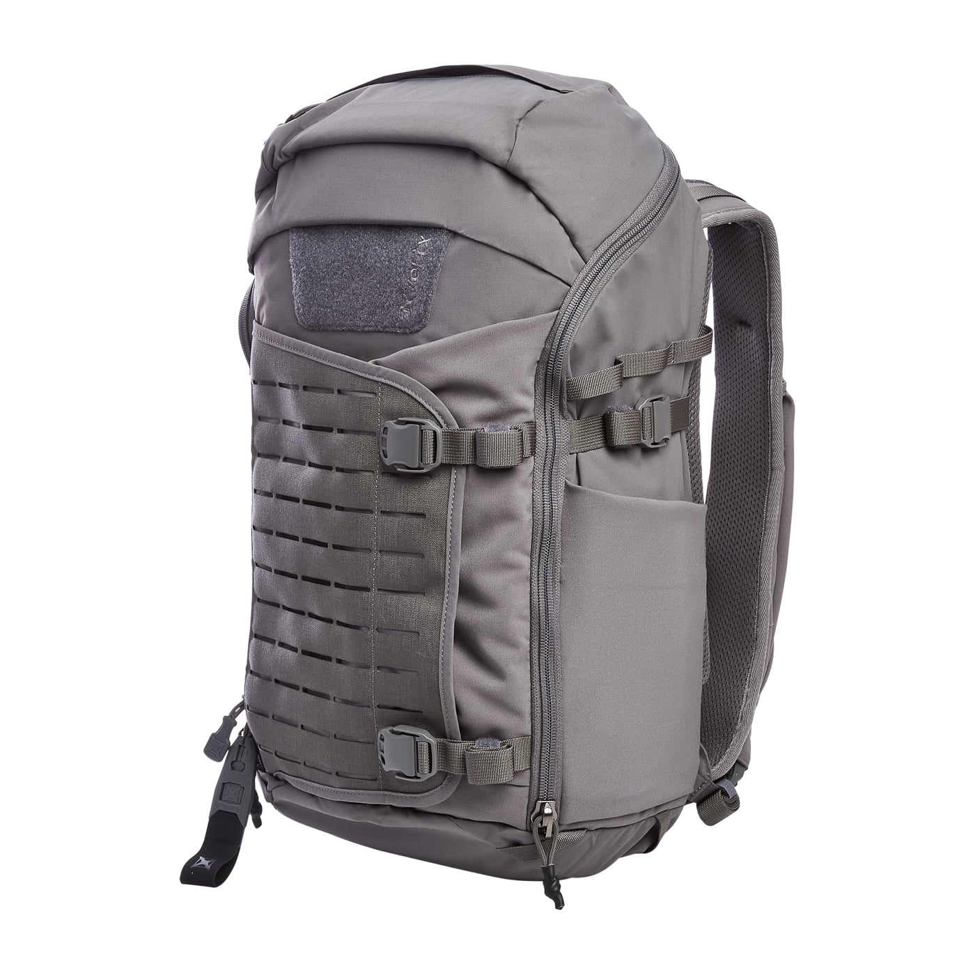 Photo of the Vertx Siege 25L Tactical Backpack in Wolf Grey colorway. The 25-liter pack is shown upright, with reinforced MOLLE webbing, expandable front pouch, and durable nylon construction. Padded shoulder straps and a ventilated back panel are visible, providing ergonomic comfort. The discreet grey finish avoids overt tactical styling, making the bag well-suited for both urban commuting and outdoor use. Water-resistant fabric and YKK zippers highlight durability. The design supports modular organization with loop-lined compartments for Tactigami accessories. The image emphasizes a subtle aesthetic paired with tactical functionality.