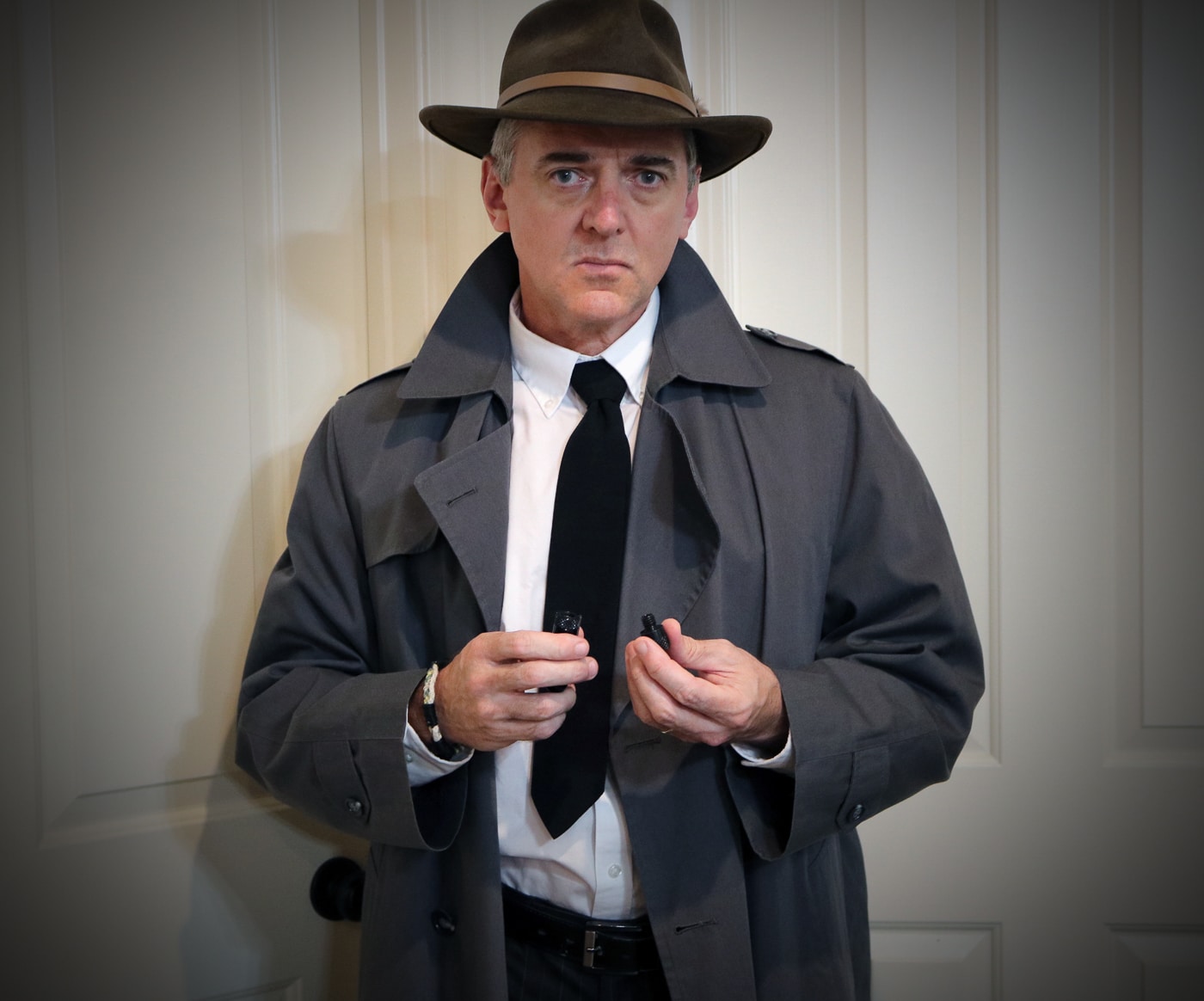 The photo shows a person holding a MAC Stinger pistol, a small 1970s-era spy gun. The firearm is cylindrical, only about 3.25 inches long, and appears very small in the hand compared to traditional pistols. Its design lacks a grip, trigger guard, or magazine, resembling a short metal tube instead of a standard handgun. The author demonstrates how the Stinger was intended to be carried and handled, showing its unusual proportions. The firearm’s tiny size made it easy to conceal in a pocket or on a keychain. However, this same compact design made it unsafe and impractical in real-world use. The image emphasizes both the novelty and danger of this Cold War curiosity.