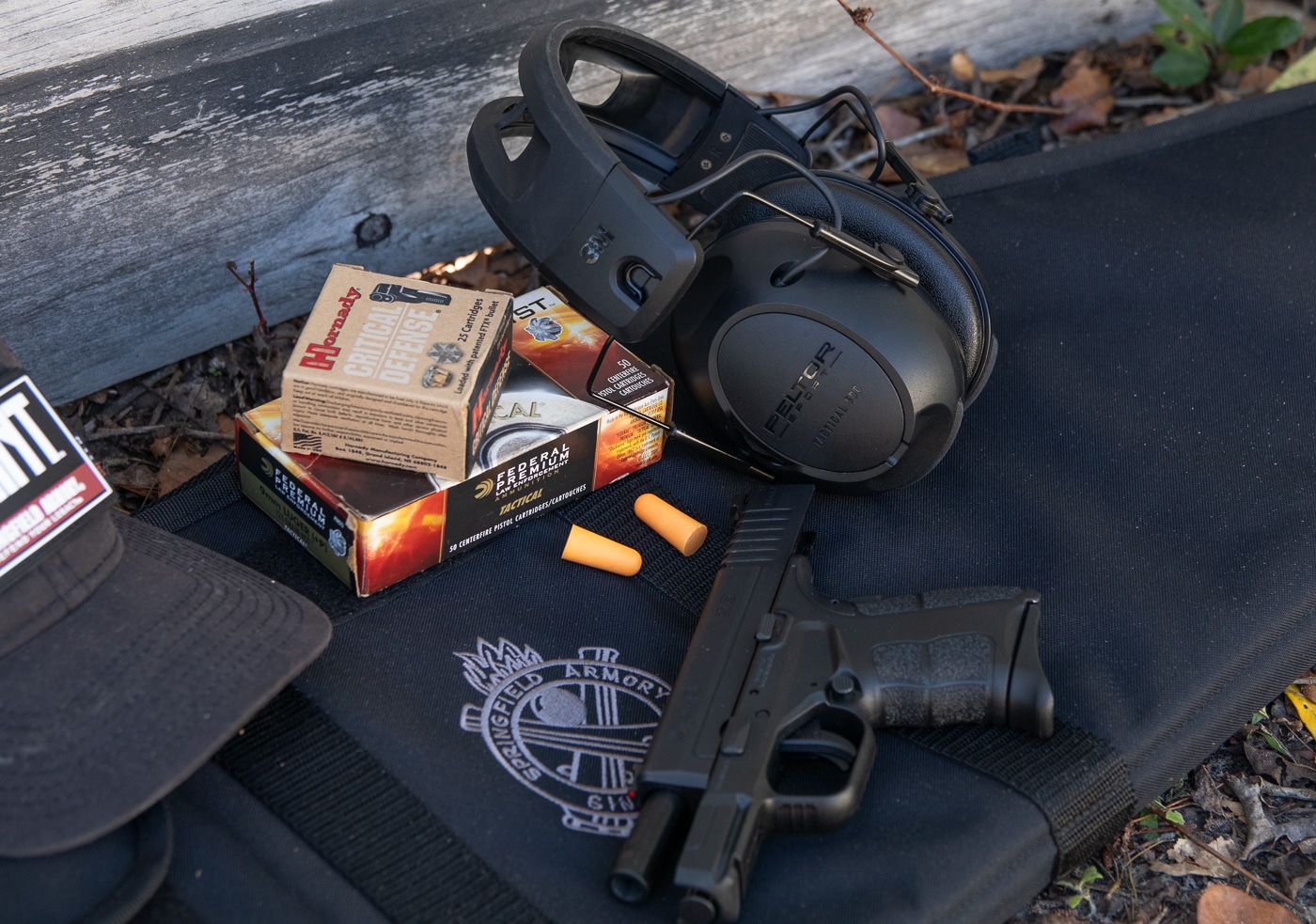 Shooting equipment and gear at firearms club range showing membership benefits of shared resources and accessories for practice. Gun clubs provide members with targets shooting bags and range equipment that individual shooters don't need to purchase separately. Joining shooting clubs offers access to shared gear including target stands ammunition storage and practice accessories. Firearms club membership includes use of club-owned equipment for pistol and rifle shooting practice sessions. Shooting range clubs maintain gear and supplies that members utilize during training reducing costs and eliminating need to transport all equipment individually to practice facilities.