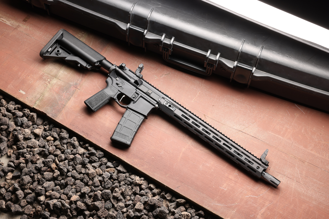 This image features the standard Springfield Armory SAINT Victor rifle chambered in 5.56x45 NATO. The rifle shown is the 16-inch version, which uses a mid-length gas system to ensure reliable operation and manageable recoil. It includes a free-float aluminum handguard with M-Lok slots, providing ample space for mounting accessories such as lights, grips, or lasers. A full-length Picatinny top rail runs across the receiver and handguard, accommodating optics or backup iron sights. The rifle is equipped with B5 Systems furniture, including the Enhanced SOPMOD stock and Type 23 P-Grip, offering improved ergonomics for the shooter. At the muzzle is a four-prong flash hider, standard across most SAINT Victor models. This configuration represents Springfield Armory’s standard AR-15 offering, providing shooters with a dependable and well-equipped 5.56 platform for a variety of applications.