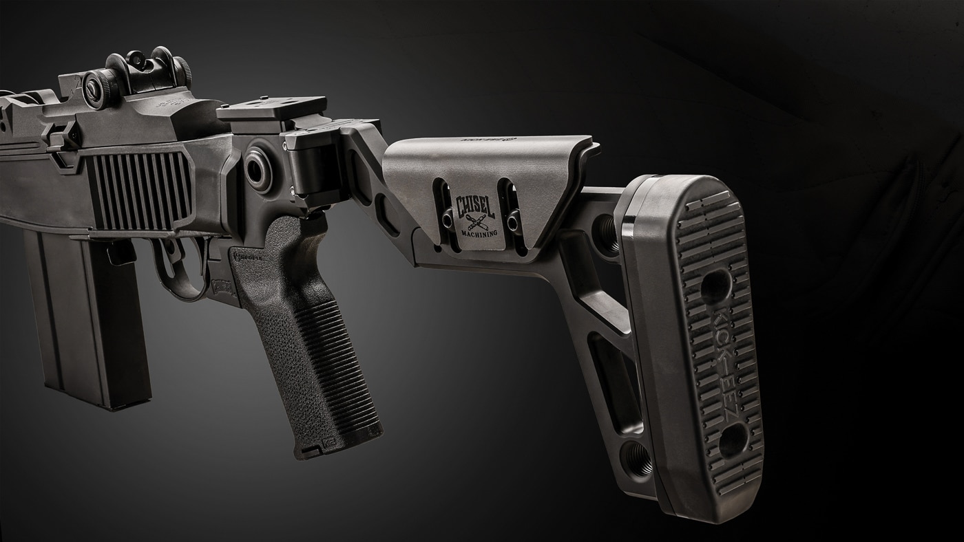 Chisel Machining aluminum billet side-folding buttstock assembly mounted to Delta 14 Chassis Gen 2 via Mossberg 500 pattern attachment system. The machined aluminum construction provides exceptional durability and rigidity when locked in the deployed position for shooting. Adjustable KICK-EEZ cheekrest allows height customization for proper scope alignment and consistent cheekweld with the M1A SOCOM rifle. KICK-EEZ recoil pad at the rear mitigates felt recoil from the powerful 7.62 NATO cartridge during extended shooting sessions. Multiple sling mounting points are visible throughout the assembly providing tactical carry options. Swappable AR-pattern Magpul MOE-K2 pistol grip offers ergonomic hand positioning and trigger control. The side-folding mechanism dramatically reduces the rifle's overall length for transport and storage. This premium buttstock option elevates the base Delta 14 chassis system to a complete tactical package priced at $579.99.