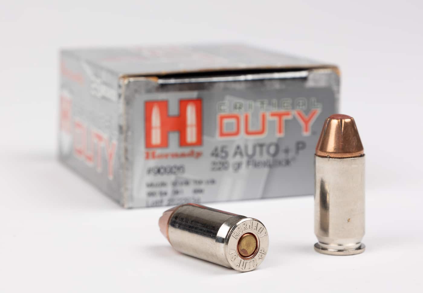 Photograph showing Hornady Critical Duty ammunition in 45 ACP caliber with plus P pressure designation for defensive shooting applications. Premium defensive ammunition loaded to higher pressure specifications offers enhanced terminal ballistics. The Critical Duty line represents quality overpressure loads from a major ammunition manufacturer. Plus P defensive ammunition costs more than standard pressure practice loads but provides increased velocity. Hornady loads this 45 ACP plus P ammunition to SAAMI overpressure specifications for reliable performance. Defensive shooters select higher pressure ammunition for carry guns and self-defense purposes. The packaging clearly displays the plus P marking indicating overpressure loading. Quality defensive loads from reputable manufacturers ensure consistent pressure levels and terminal performance.