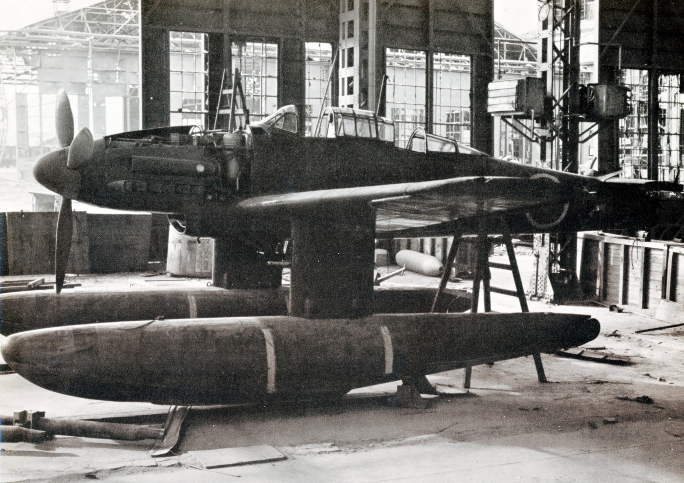 A wartime image of the Aichi M6A1 Seiran floatplane, showing the sleek fuselage and twin underwing floats that could be detached during flight. The Seiran was developed by the Imperial Japanese Navy for launch from I-400 class submarine aircraft carriers. The floats allowed water landings but could be jettisoned to improve speed or maneuverability. For suicide or one-way missions, the aircraft could be launched without floats entirely. Only 28 Seiran aircraft were completed before Japan’s surrender in 1945. This image highlights the ingenuity and desperation behind Japan’s late-war naval aviation projects.