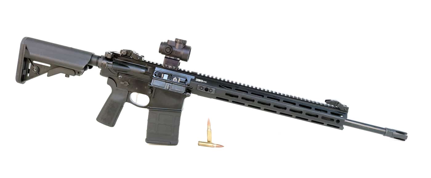 A photo of a Springfield Armory SAINT Victor AR-10 rifle chambered in 7.62x51mm NATO, displayed horizontally on a clean background. The rifle features a modern black anodized finish, lightweight aluminum receivers, and polymer furniture typical of the AR-10 platform. This design emphasizes modularity, allowing shooters to easily mount optics, lights, or accessories. The AR-10 architecture traces back to Eugene Stoner’s 1950s innovation but has evolved with advanced coatings, materials, and improved ergonomics. The image highlights the rifle’s rail system, adjustable stock, and overall balance. It represents the modern evolution of the .308 semi-automatic rifle — accurate, adaptable, and field-ready. The photo helps illustrate why the AR-10 remains a benchmark for full-power semi-auto rifles.
