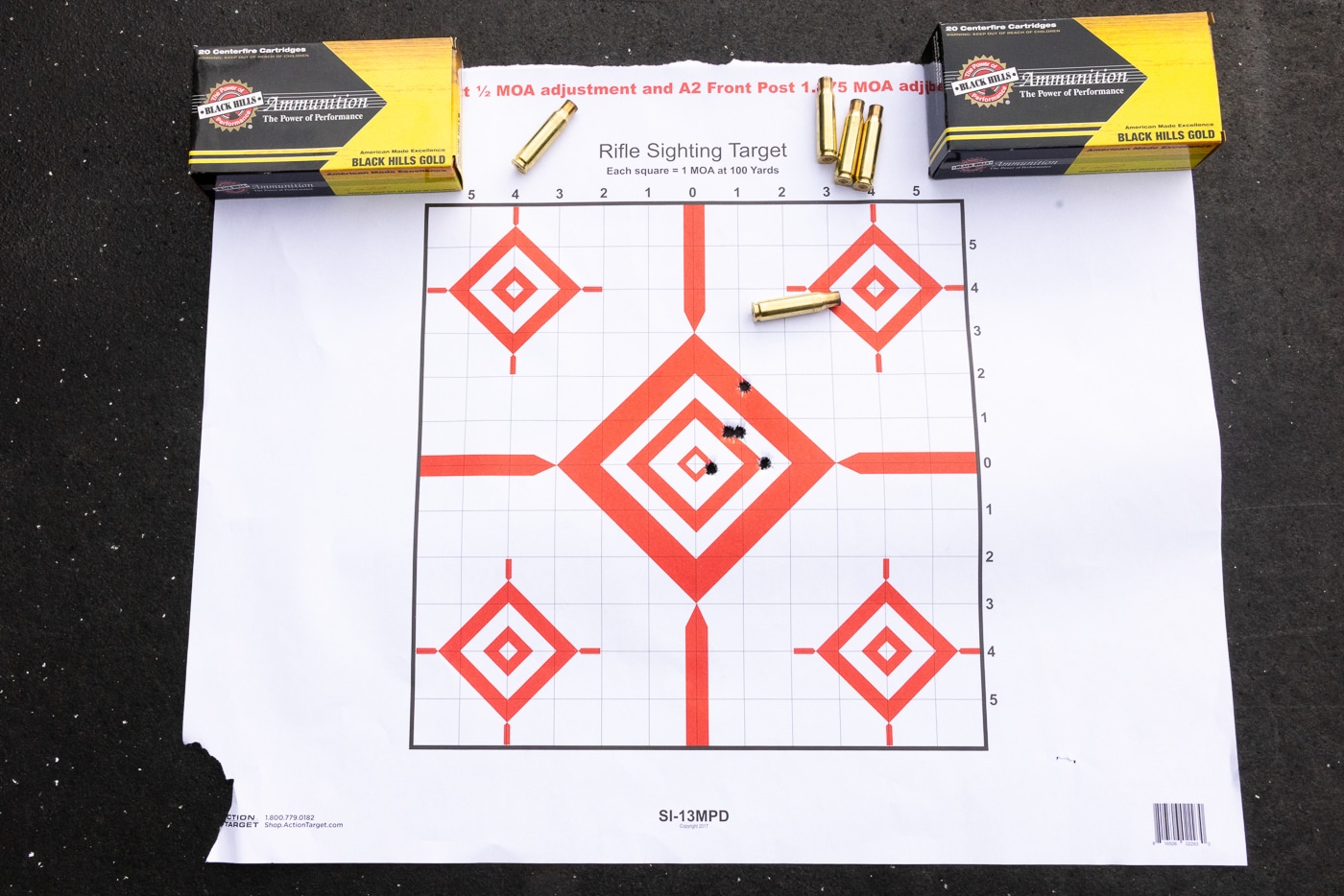 Two hundred yard test target showing groups fired with Black Hills Gold .308 Winchester 168-grain Hornady ELD Match ammunition. Accuracy results at extended distance demonstrate Black Hills .308 ammo with 168-gr ELD Match bullets maintaining precision. Target displaying Black Hills Gold 308 Winchester cartridge performance at 200 yards with five-shot groups. Best group measuring 1.90 inches with Black Hills .308 Win ammunition loaded with 168 grain ELD projectiles. Long-range testing of Black Hills Ammunition Gold line .308 168-gr ELD Match loads. Action Target rifle sighting target used for 200 yard evaluation of Black Hills .308 ammo. Target shows Black Hills Gold 308 Winchester with 168 grain Hornady ELD bullets delivering consistent downrange accuracy. Extended distance test reveals Black Hills .308 Win cartridges with 168-gr ELD Match technology perform reliably.
