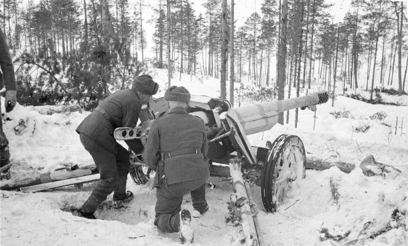 7.5 cm Pak 97/38 anti-tank gun in action with Finnish troops in the Continuation War circa 1943