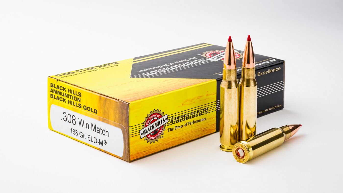 Black Hills Gold .308 Winchester ammunition box and cartridges loaded with 168-grain Hornady ELD Match bullets. Premium Black Hills .308 ammo featuring 168-gr ELD projectiles for precision rifle shooting. Black Hills Ammunition Gold line 308 Win cartridges with Hornady ELD Match bullet technology. Rifle ammunition from Black Hills company in Rapid City South Dakota showing 168 grain ELD loads. Black Hills Gold .308 Winchester ammo represents high-quality hunting and target cartridges. Box of Black Hills .308 Win ammunition with 168-gr Hornady ELD Match bullets for accuracy testing. Precision rifle cartridges from Black Hills Ammunition featuring 168 grain ELD projectiles. Black Hills Gold 308 ammo loaded with ELD Match bullets delivers consistent velocity and tight groups.