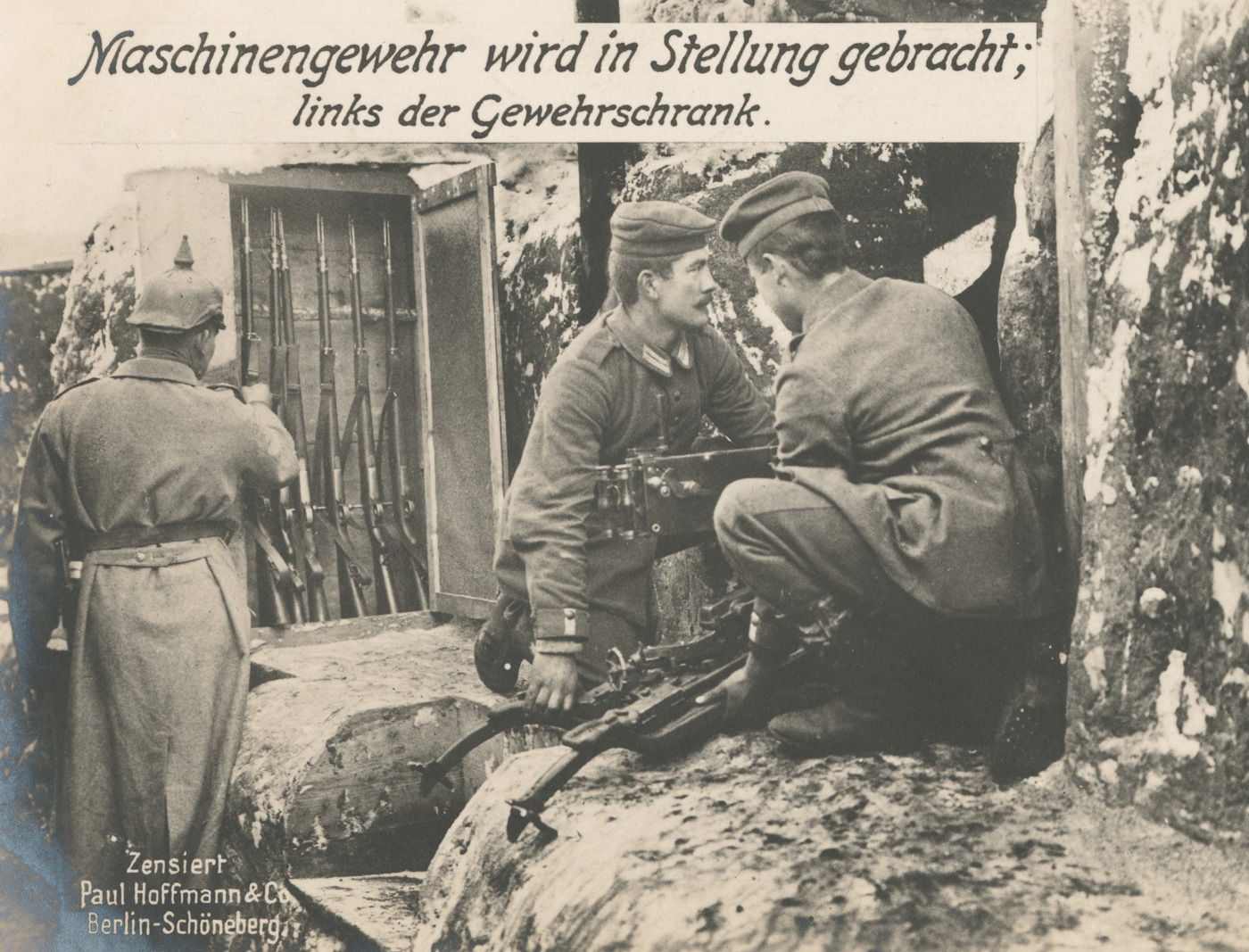 Historical World War I photograph showing German trench rifle locker storing multiple Gewehr 98 bolt-action rifles in defensive position illustrating how Imperial German infantry organized and protected their weapons during Great War trench warfare. The rifle locker contains several Gew 98 rifles with visible wooden stocks and long barrels stored vertically to save space in cramped trench conditions where soldiers lived for extended periods. These 7.92x57mm Mauser rifles stored in the locker represent standard German infantry weapons that needed protection from mud, water, and debris common in World War I trenches at Somme, Verdun, Ypres, and Fromelles. The organized storage system for Gewehr 98 rifles demonstrates German military efficiency in maintaining the reliable bolt-action rifles that soldiers depended on for survival during trench combat from 1914 through 1918 when proper weapon maintenance proved critical for the controlled-feed Mauser action G98 rifles.