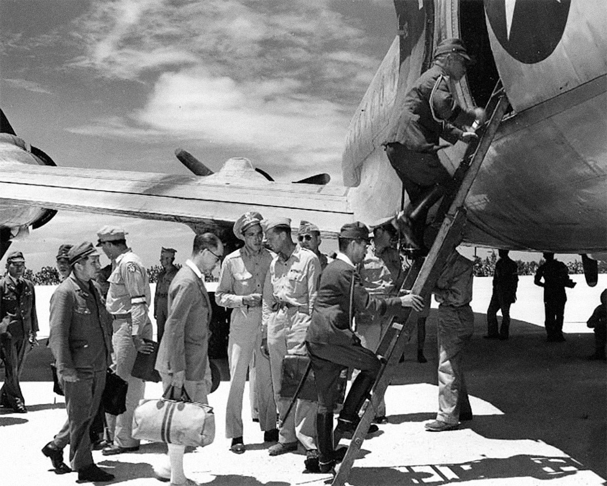 Japanese delegation climbs ladder Ie Shima C-54