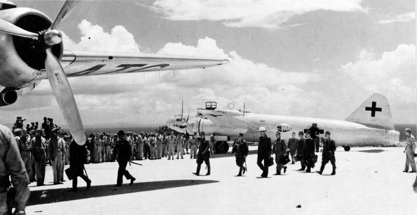 Japanese surrender delegation with Betty bomber Ie Shima