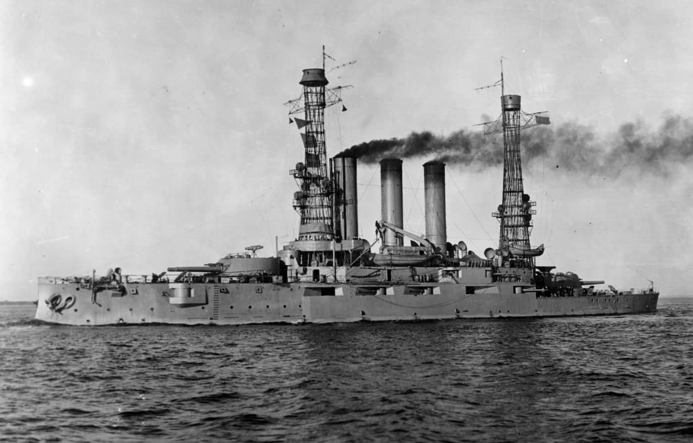 USS Maine BB-10 American battleship underway in the Atlantic Ocean, representing the Maine-class pre-dreadnought battleships that incorporated significant technological improvements over earlier United States Navy vessels. The Maine-class consisted of three ships, USS Maine BB-10, USS Missouri BB-11, and USS Ohio BB-12, all commissioned between 1902 and 1904 with modern features including smokeless powder propellant for higher-velocity guns and new stronger armor that outclassed all previous American battleships. This USS Maine should not be confused with the earlier vessel of the same name that sank in Havana Harbor in 1898, sparking the Spanish-American War where pre-dreadnought battleships proved their combat worth. The photograph shows USS Maine BB-10 steaming at sea with characteristic pre-dreadnought features including mixed-caliber gun batteries, multiple funnels, heavy military masts, and the robust hull construction typical of early 20th century United States battleships. Despite being very modern when designed, these Maine-class pre-dreadnought battleships were eventually relegated to training ship duties during World War II as dreadnoughts, super-dreadnoughts, standard-type battleships, and fast battleships superseded older vessel designs. The image captures USS Maine BB-10 during operational service when these American battleships represented the cutting edge of U.S. Navy capital ship technology before the HMS Dreadnought revolutionized naval warfare in 1906. All three Maine-class vessels were scrapped shortly after World War II, having served primarily in training roles teaching new sailors the fundamentals of battleship operations during the massive wartime naval expansion. As pre-dreadnought battleships built during the transitional period before uniform all-big-gun batteries became standard, the Maine-class vessels represent an important step in American battleship evolution from experimental early designs toward the powerful dreadnoughts and eventually the mighty Iowa-class fast battleships that would dominate the seas.
ALT Text 2:
Historic photograph of USS Maine BB-10 United States battleship underway in Atlantic waters, one of three Maine-class pre-dreadnought battleships that represented substantial advancements in American naval construction during the early 1900s. The Maine-class vessels, including USS Maine BB-10, USS Missouri BB-11, and USS Ohio BB-12, were commissioned between 1902 and 1904 and featured modern innovations like smokeless powder for higher-velocity main guns and new armor that was stronger and more effective than protection systems on all previous American battleships. This USS Maine BB-10 is distinct from the earlier, more famous USS Maine that exploded in Havana Harbor in 1898, an incident that led to the Spanish-American War where early United States battleships like the Indiana-class saw combat. The image shows USS Maine BB-10 steaming at sea displaying typical pre-dreadnought battleship characteristics including mixed-caliber armament with both large and small guns, prominent smoke stacks, heavy superstructure, and military masts common to all American battleships built before the dreadnought revolution. Despite incorporating cutting-edge technology when designed, the Maine-class pre-dreadnought battleships were used only as training vessels during World War II as more modern dreadnoughts, super-dreadnoughts, standard-type battleships, and fast battleships took over frontline combat duties. This photograph captures USS Maine BB-10 during her operational period when these American battleships represented the most advanced capital ships in the United States Navy fleet before HMS Dreadnought made all existing battleships obsolete in 1906. All three Maine-class vessels were scrapped shortly after World War II ended, having spent their wartime service teaching countless sailors the fundamentals of battleship operations needed for the massive naval expansion. As transitional pre-dreadnought battleships incorporating modern weapons and armor while still retaining mixed-caliber gun batteries, the Maine-class represents the final evolutionary steps before the dreadnought era transformed American battleship design completely.
ALT Text 3:
USS Maine BB-10 pre-dreadnought battleship photographed underway in the Atlantic Ocean, showcasing one of three Maine-class vessels that embodied significant technological progress in United States battleship construction during the early 20th century. The Maine-class American battleships, consisting of USS Maine BB-10, USS Missouri BB-11, and USS Ohio BB-12, were all commissioned between 1902 and 1904 and featured advanced systems including smokeless powder propellant that enabled higher-velocity gun performance and new superior armor that outperformed protective schemes on all earlier United States Navy battleships. This USS Maine BB-10 should not be confused with the earlier famous USS Maine whose 1898 sinking in Havana Harbor triggered the Spanish-American War, a conflict where American pre-dreadnought battleships demonstrated their combat capabilities. The photograph captures USS Maine BB-10 steaming at sea with the characteristic pre-dreadnought profile including mixed-caliber main and secondary batteries, multiple funnels producing steam, heavy military masts for observation and communications, and robust construction typical of turn-of-the-century American battleships. Although very modern when designed and commissioned, the Maine-class pre-dreadnought battleships were eventually demoted to training ship roles during World War II as newer dreadnoughts, super-dreadnoughts, standard-type battleships, and fast battleships assumed frontline combat responsibilities in the expanding U.S. Navy. This image documents USS Maine BB-10 during operational service when these vessels represented the pinnacle of American battleship technology before the 1906 launch of HMS Dreadnought revolutionized capital ship design worldwide with uniform all-big-gun batteries. All three Maine-class battleships were scrapped shortly after World War II concluded, having spent the war years training the thousands of sailors needed to man the rapidly expanding United States battleship fleet. As advanced pre-dreadnought battleships that bridged the gap between experimental early American designs and the revolutionary dreadnought-type vessels that followed, the Maine-class occupies an important position in the evolution of U.S. Navy capital ships.