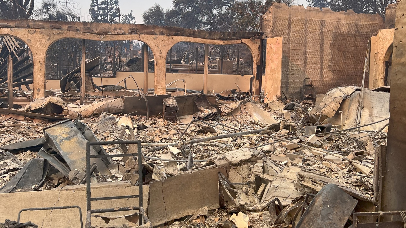 Charred residential structure after Palisades Fire showing why firearm owners must prioritize insuring guns and related equipment with adequate coverage limits. Total home loss destroys entire gun collections including rifles, pistols, shotguns, vintage firearms, ammunition stockpiles, reloading equipment, cleaning supplies, gun safes, optics, and accessories requiring comprehensive gun insurance policies. Proper firearms insurance coverage goes beyond basic homeowners or renters insurance which often caps payouts for weapon losses at insufficient levels. Gun owners should photograph all firearms showing serial numbers and maintain detailed spreadsheets documenting their collection to support insurance claims after fire destroys their property. Insuring your guns properly means understanding policy limits, documentation requirements, and coverage specifics for firearms and accessories before disaster strikes.