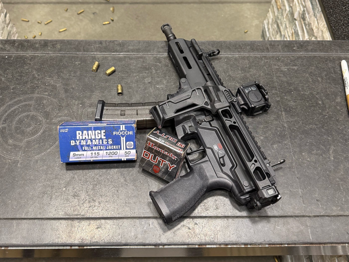 Range training session with Springfield Armory Kuna truck gun showing shooter practicing defensive pistol skills and firearm proficiency development. Kuna 9mm pistol range practice demonstrating importance of hands-on training with vehicle defense firearm before emergency situations. Springfield Armory truck gun training illustrating proper shooting techniques and stance with roller-delayed defensive pistol. Shooter conducting live fire exercises with Kuna vehicle gun building muscle memory and familiarity with personal protection firearm. Range practice with Springfield Armory Kuna featuring folding brace and compact design for realistic defensive training scenarios. Defensive firearm training session showing Kuna pistol reliability testing through hundreds of rounds for truck gun validation. Springfield Armory Kuna range work demonstrating flat-shooting characteristics and controllability during extended practice sessions. Truck gun proficiency training with Kuna defensive pistol emphasizing accuracy drills and proper handling techniques for self-defense preparedness.