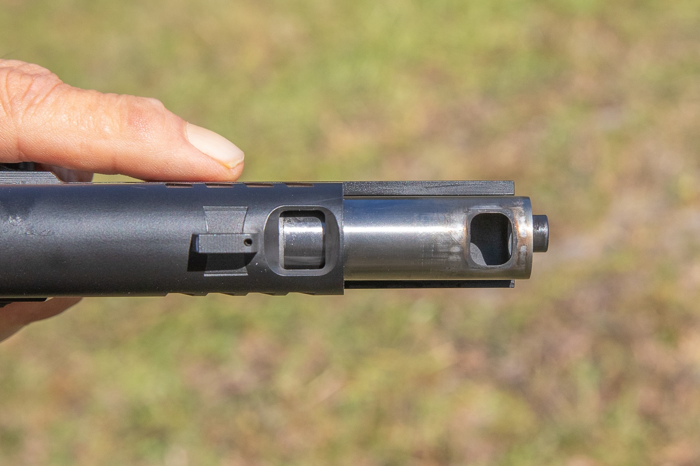 view of the top of the gun with the comp clearly visible