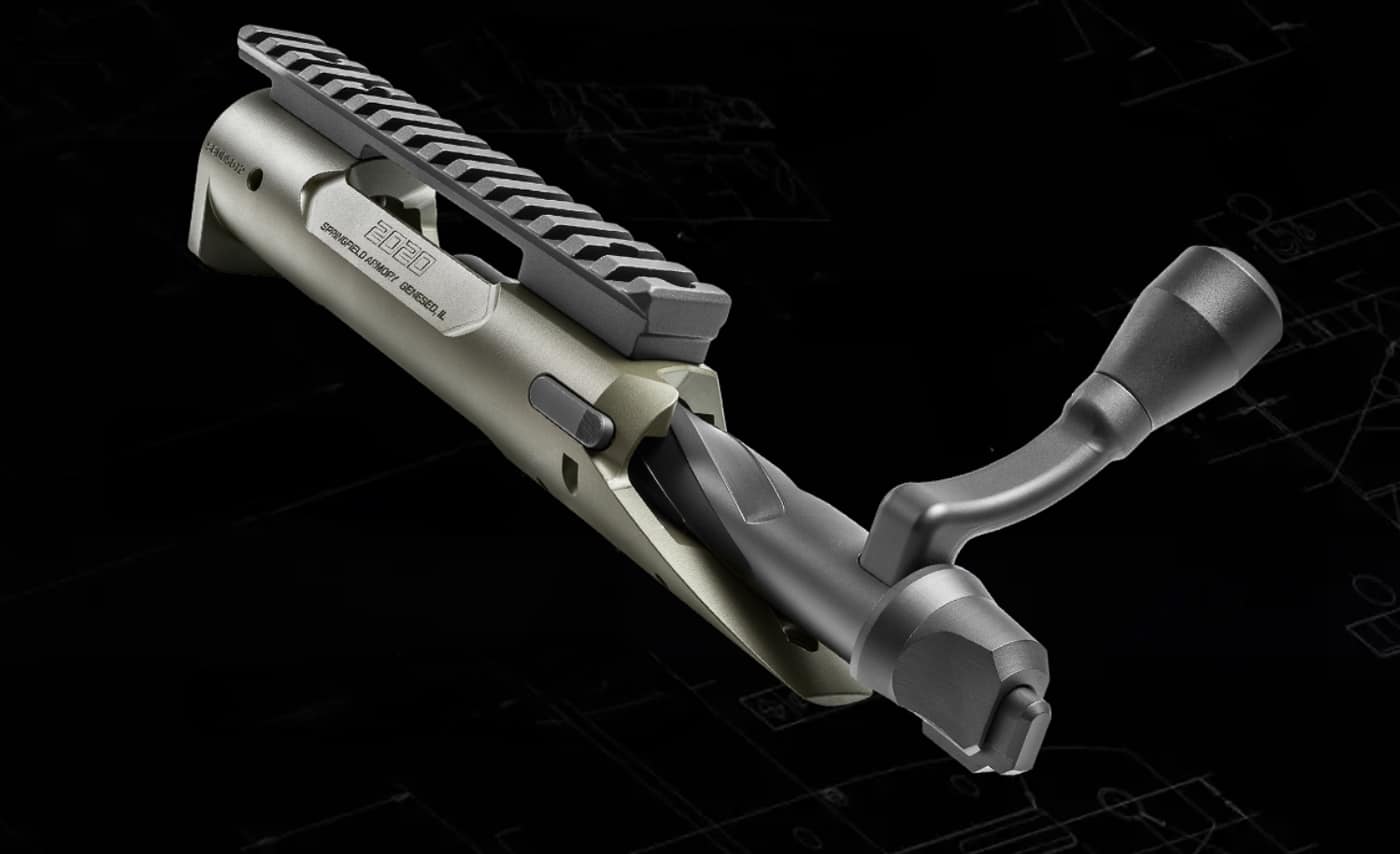 Model 2020 action features dual locking lugs on the fluted bolt that run down EDM