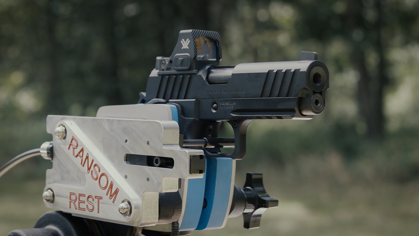 The Springfield Prodigy Compact is secured in a Ransom Masters Series mechanical rest for precision accuracy testing. The Springfield Armory Prodigy Compact review required eliminating human error. This bench rest testing measures inherent firearm accuracy. The compact 1911 DS fired five-shot groups at 15 yards. Testers evaluated four different 9mm ammunition types. The Prodigy Compact achieved sub-inch groupings consistently. Springfield's double-stack pistol demonstrated excellent precision. The mechanical rest uses a remote cable pull system. This accuracy testing confirms the handgun's capability.