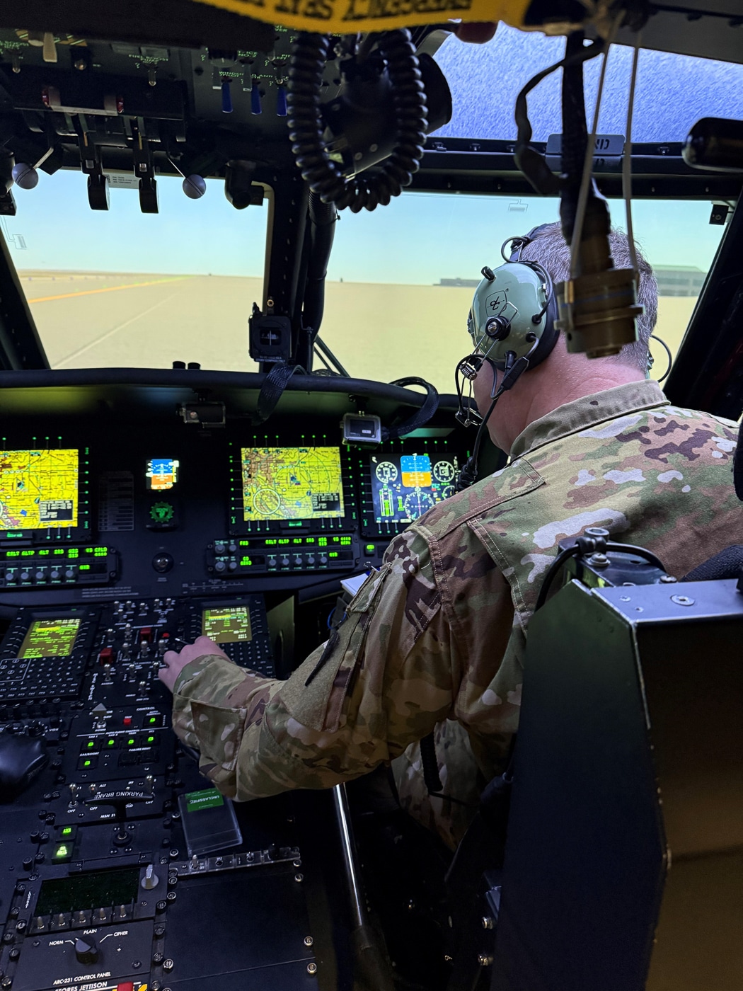 US Army aviators work in a simulated MV-75 to provide feedback to Bell