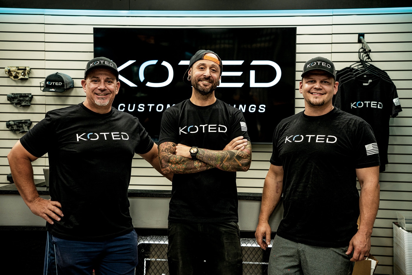 Three firearms finishing professionals stand in their workshop filled with coating equipment, laser machines, and polishing tools for custom work. Exclusive Koted interview shares industry insights. Koted Custom Finishings builds one-off heirloom pieces. The interview of Koted examines creative processes. Professional finishing combines artistry with efficiency. Koted interview discusses competitive market positioning. Metal plating complements Cerakote finishing work. Interview of Koted reveals cross-industry expansion. Koted maintains craftsmanship at production scale.

Ready for the next [PHOTO DESCRIPTION].Incognito chats aren’t saved to history or used to train models. Sonnet 4.5