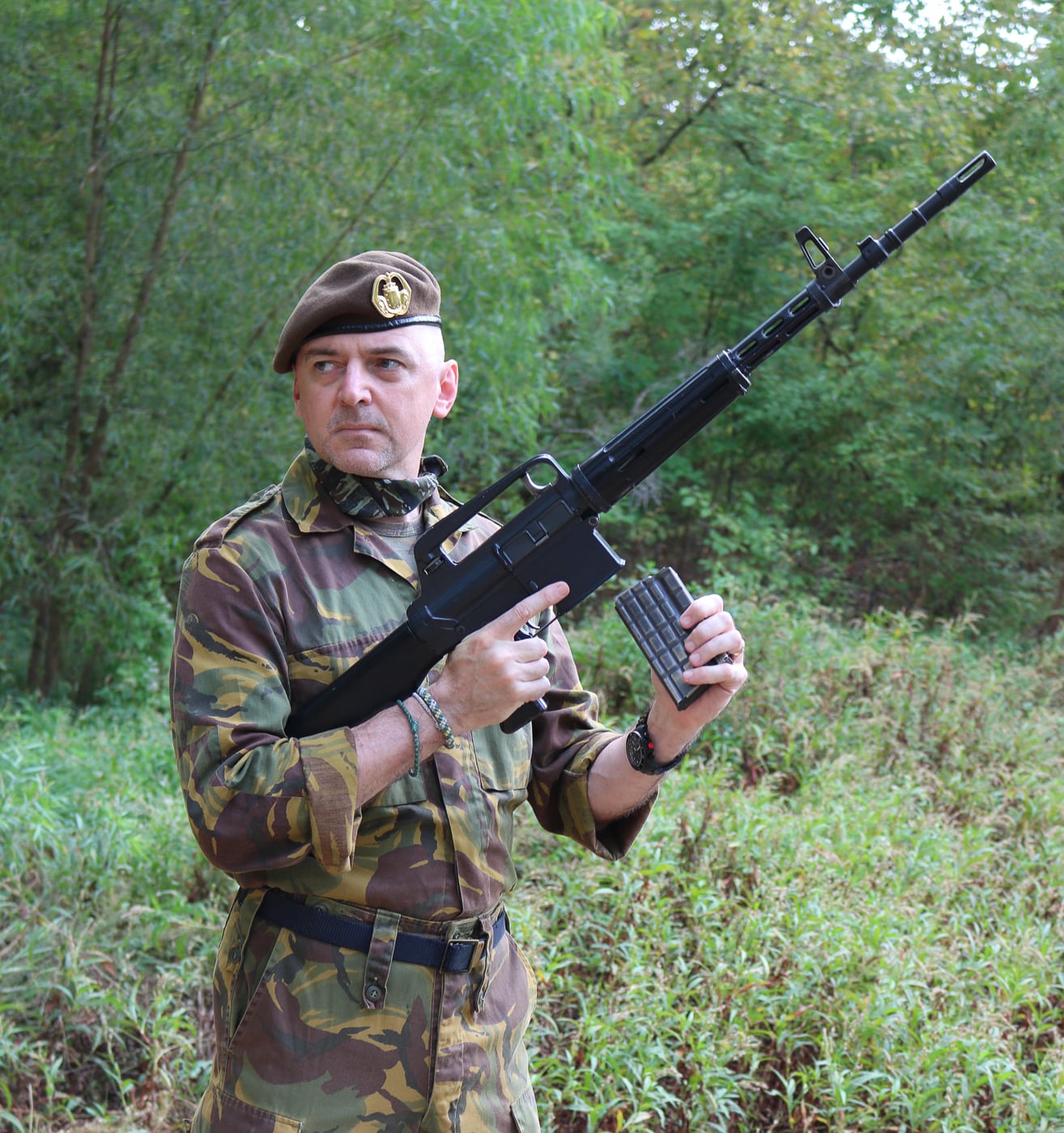 A historic AR-10 rifle photographed to showcase its distinctive features and classic battle rifle design from the 1950s era. The AR-10 revolutionized firearms design. Eugene Stoner created the AR-10. The AR-10 featured direct gas impingement. AR10 history began in 1955. The rifle used 7.62x51mm ammunition. Stoner worked for ArmaLite division. The AR-10 preceded the AR-15. Dutch manufacturers produced early AR-10s.