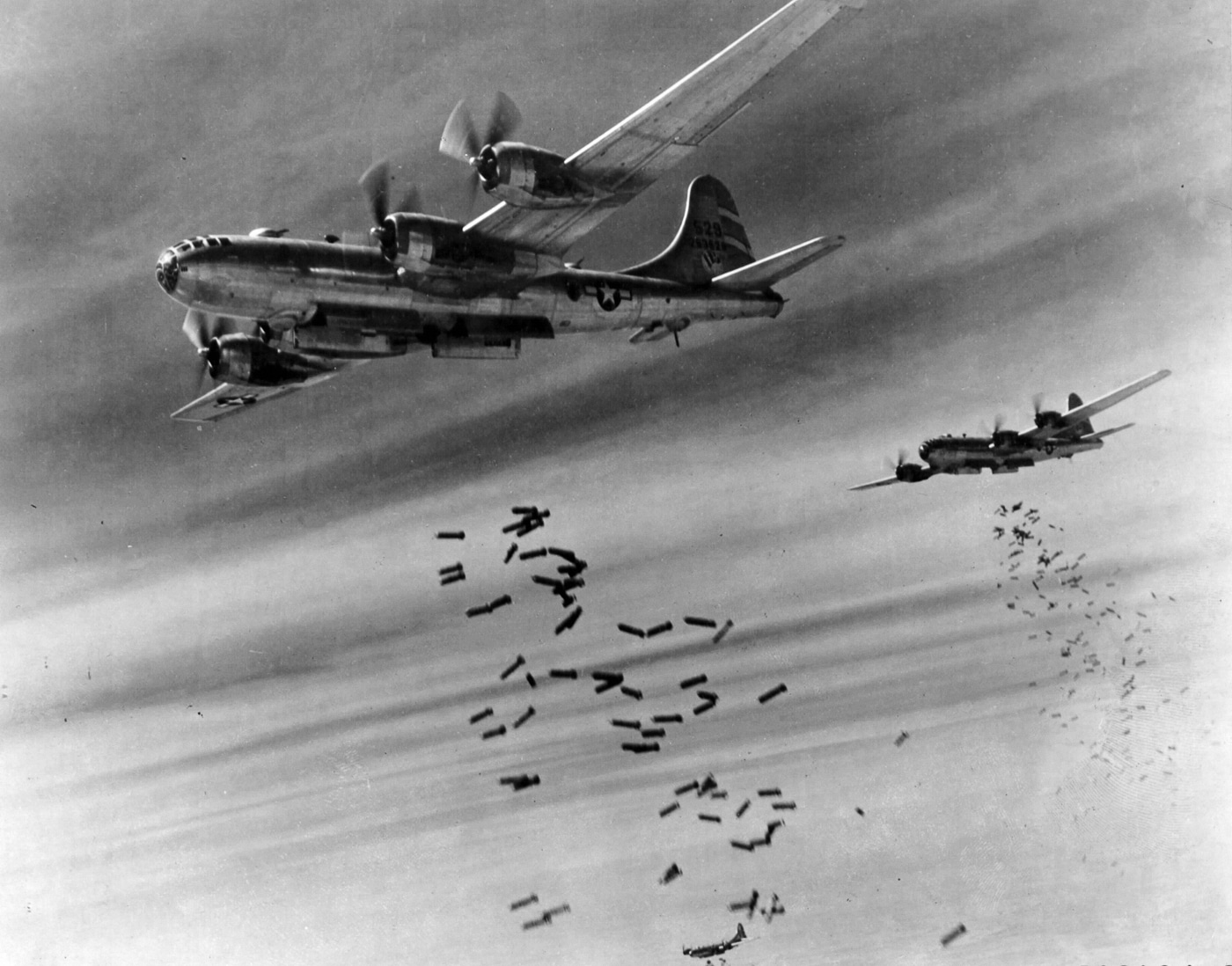 Boeing B-29 Superfortress bombers dropping bombs on Japanese targets in World War II