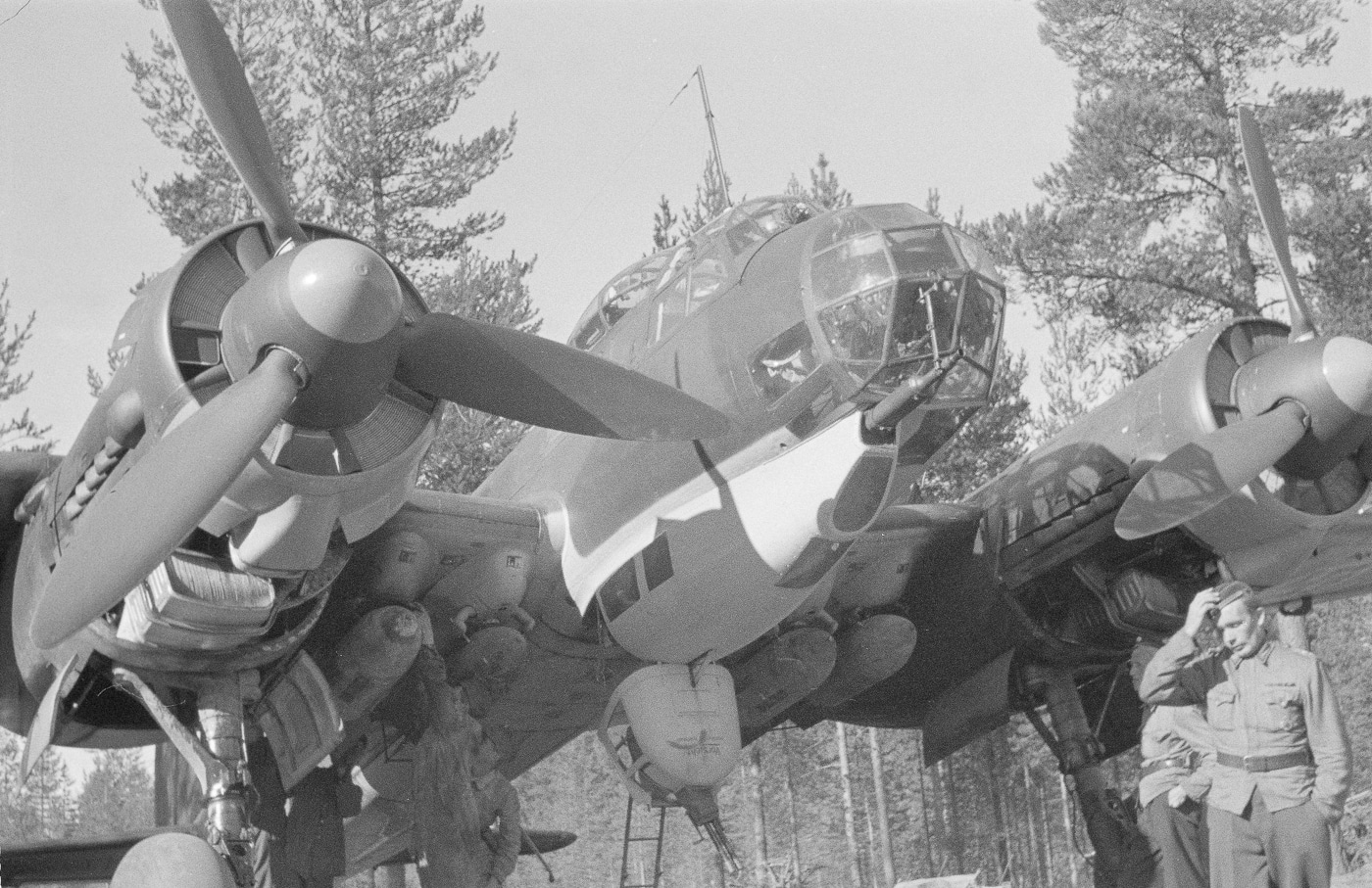 A Finnish Air Force Junkers Ju 88A bomber positioned for departure on an airfield runway near Joensuu in eastern Finland. The Ju 88 bomber served allied nation air forces. Finnish aviation conducted operations against Soviet forces. Joensuu airfields provided forward operating locations. Eastern Finland bases enabled border region missions. Allied aircraft attacked Red Army targets. Pre-takeoff preparations followed standard procedures. Finnish crews operated German-supplied equipment. Historical photographs document international operations.