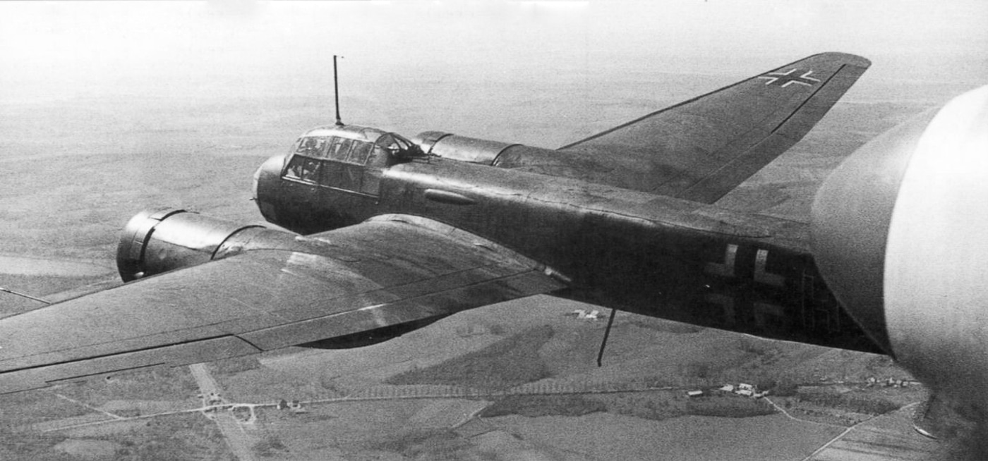 A Junkers Ju 88 bomber from III./Kampfgeschwader 77 photographed during a flight mission showing its twin-engine configuration and streamlined airframe design. The Ju 88 bomber performed tactical strike missions. KG 77 operated across multiple combat theaters. German bombers conducted offensive operations continuously. In-flight photography captured aircraft operational profiles. Twin-engine designs provided range and payload. Kampfgeschwader units maintained active sortie schedules. Aerodynamic profiles enabled respectable flight speeds. Historical aviation images document unit aircraft.