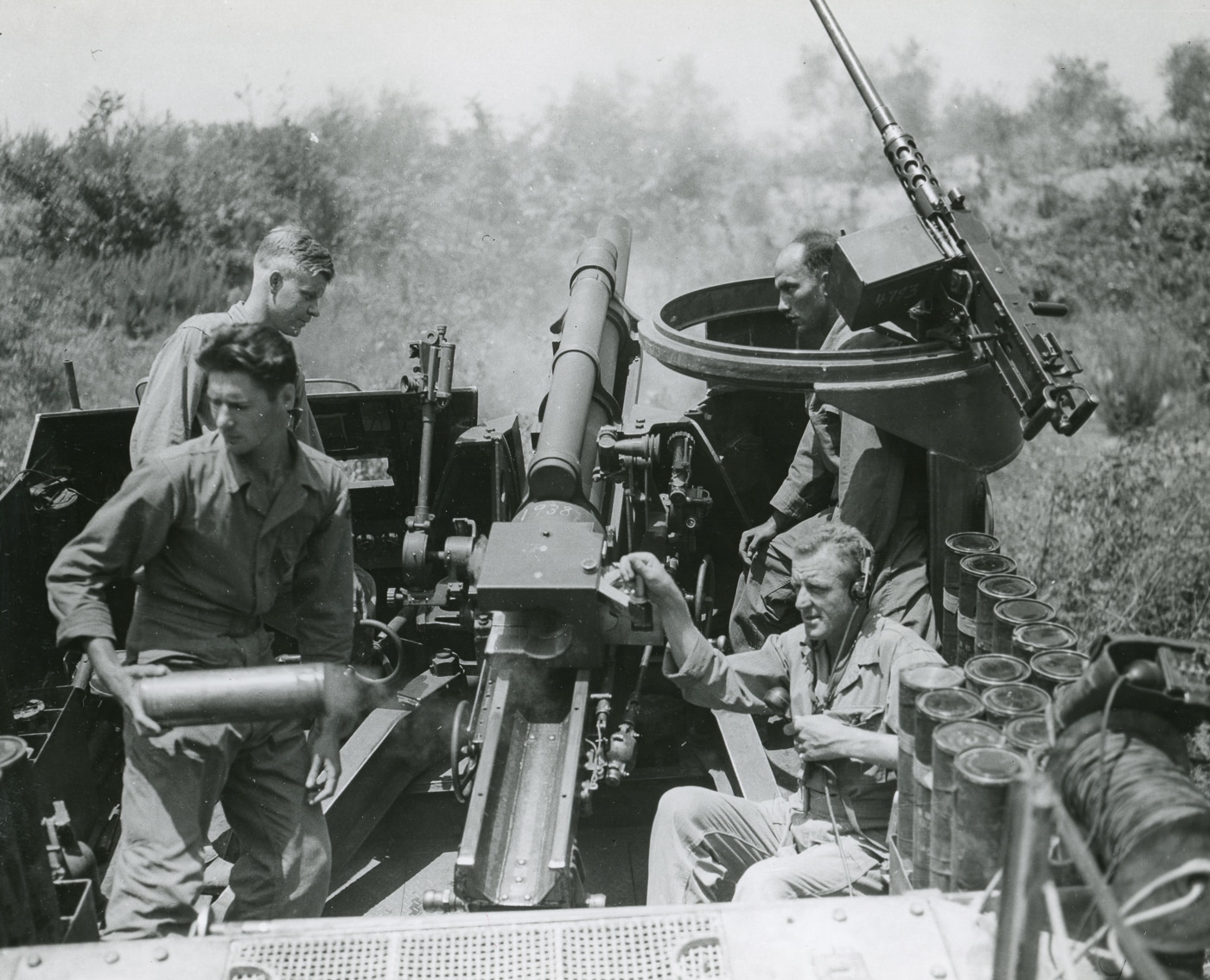 M7 Priest crew firing an artillery mission in Italy 1944