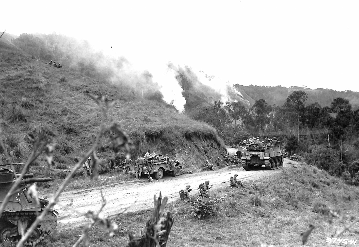 M7 Priests advance with M4 Sherman tanks in Cagayan Valley Luzon
