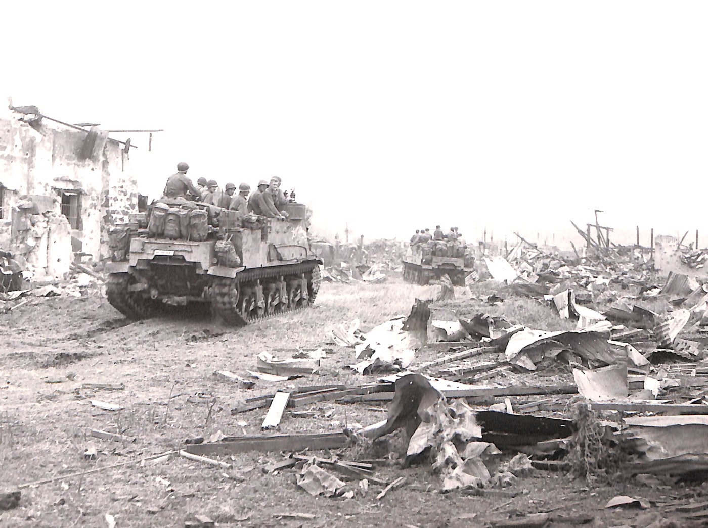 M7 Priests move through Legazpi City Luzon after landing