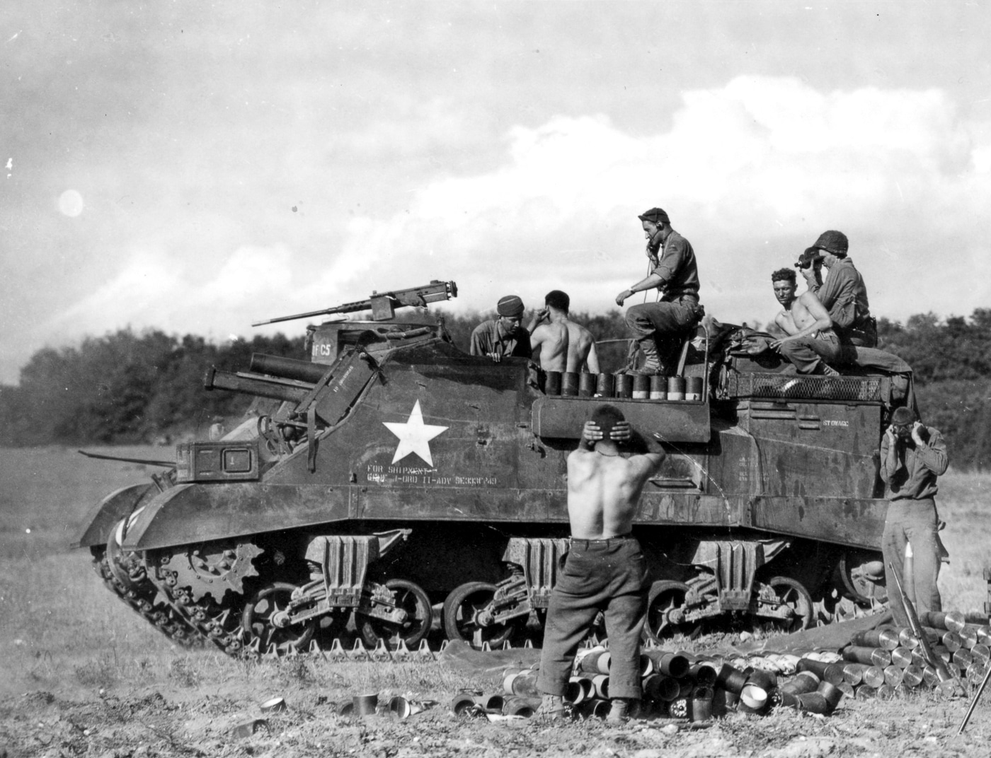 M7 crew fires artillery mission in France 1944