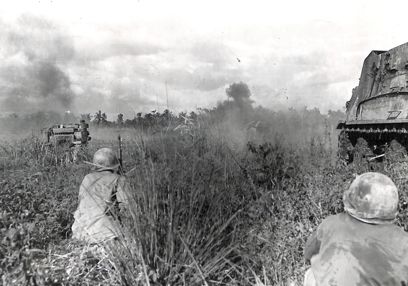 M7 crews provide direct fire support against Japanese bunkers on outskirts of Tabontabon Leyte Philippines