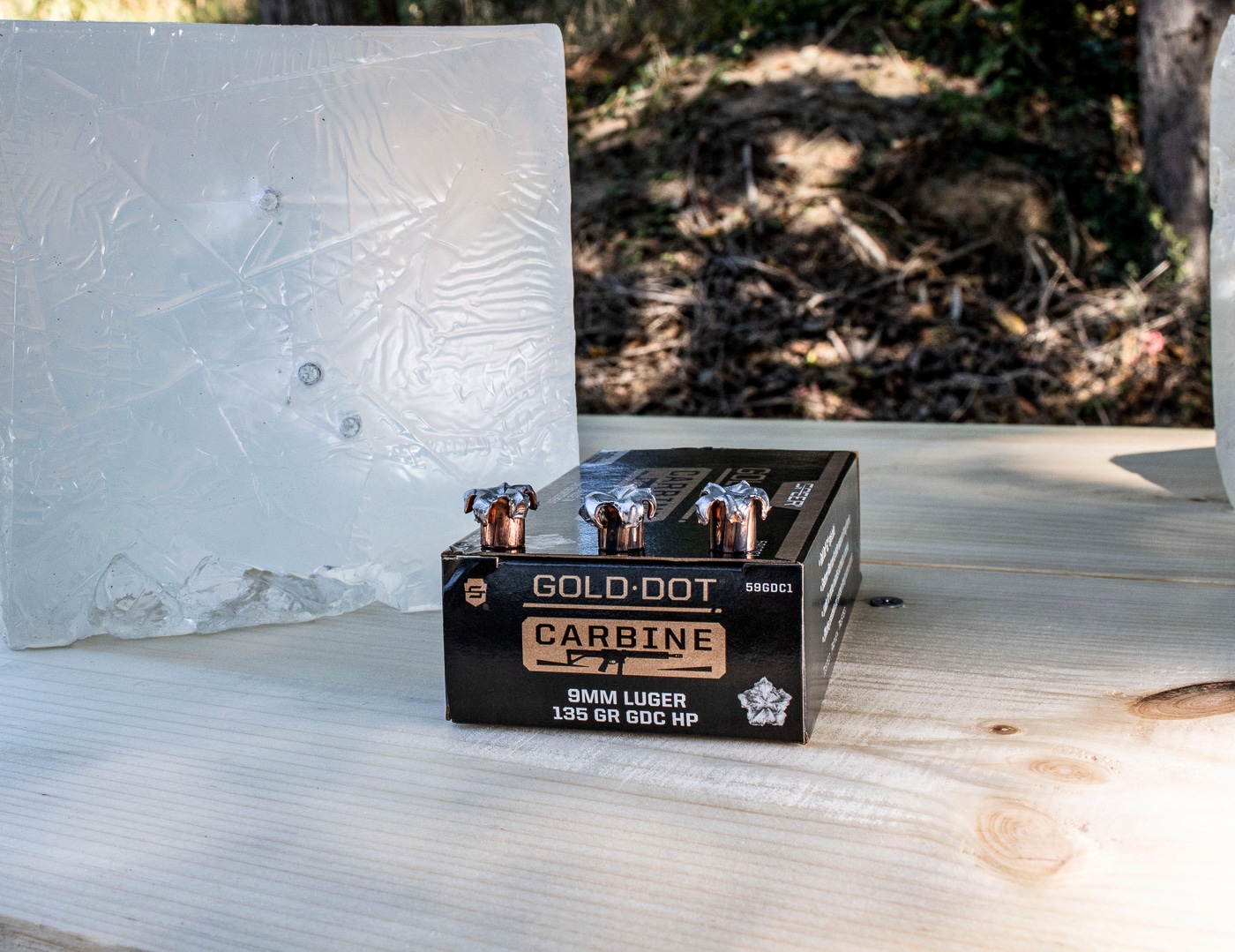 Three expanded Speer Gold Dot Carbine bullets are displayed side-by-side showing uniform mushroom expansion with intact petals. Speer Gold Dot Carbine ammunition expands consistently across distances. PCC ammo maintains structural integrity after impact. The recovered bullets show flower-like petal deployment. Gold Dot projectiles retained 131.25 grains average weight. Pistol caliber carbines deliver enhanced terminal performance. The Speer Gold Dot Carbine review documents expansion characteristics. Bonded bullets prevent jacket-core separation completely. Springfield Armory SAINT Victor achieved 19-inch penetration depth.