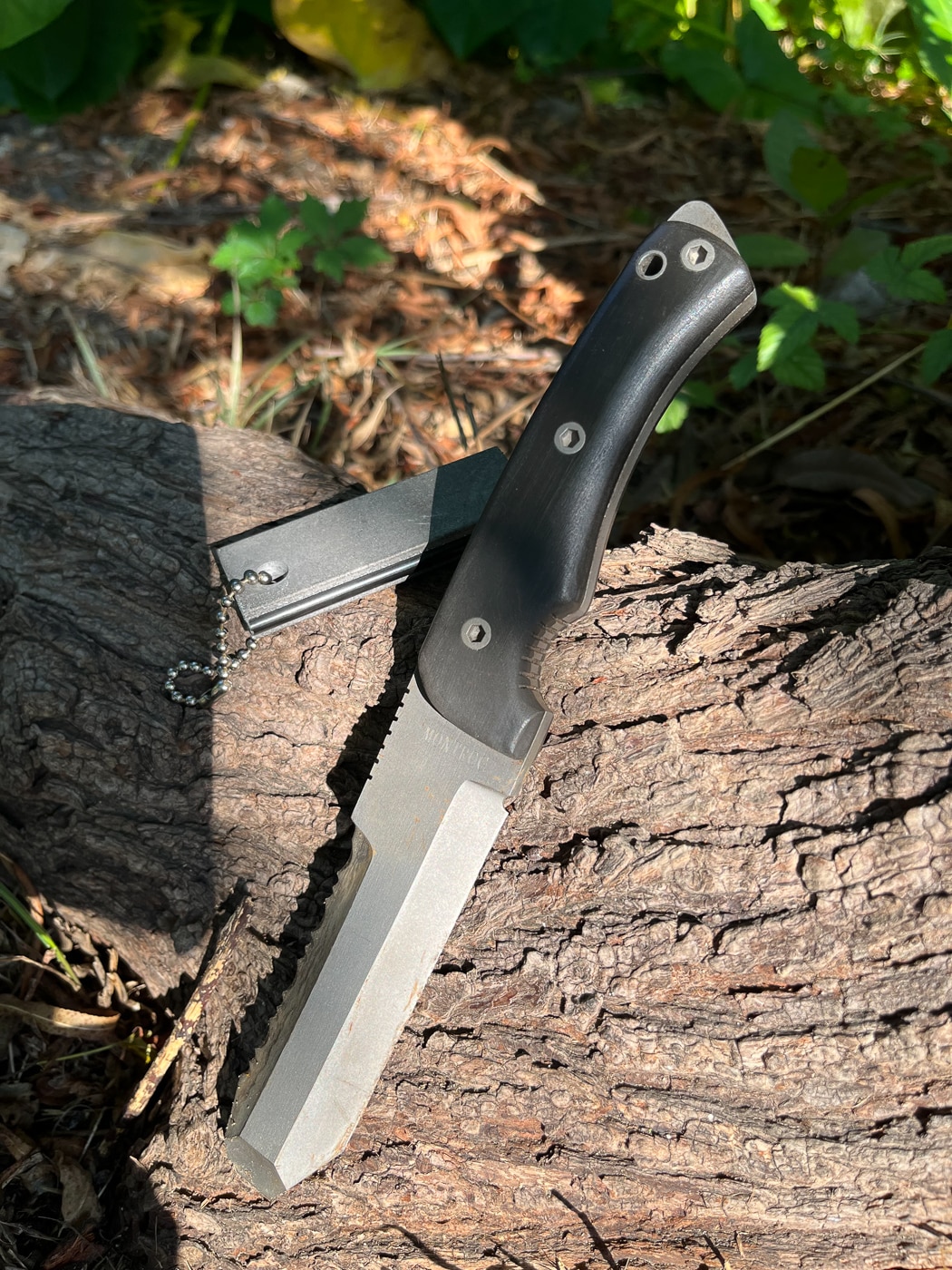 A heavy-duty Ennis knife with chisel-ground blade edge, designed by the late knifemaker Ray Ennis for extreme leverage and brute-force fieldcraft applications. Fieldcraft knives serve specialized heavy-duty purposes. Ultra-rugged designs prevent blade failure. Dale Dye field craft knife opinions value purpose-built tools.