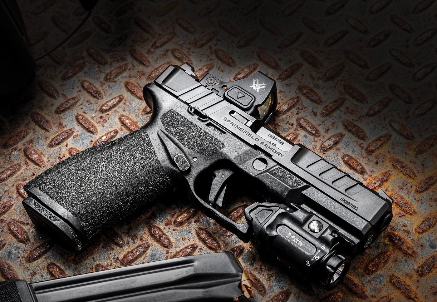 Echelon 4.0FC 9mm pistol with loaded magazine, along with mounted red dot optic and light