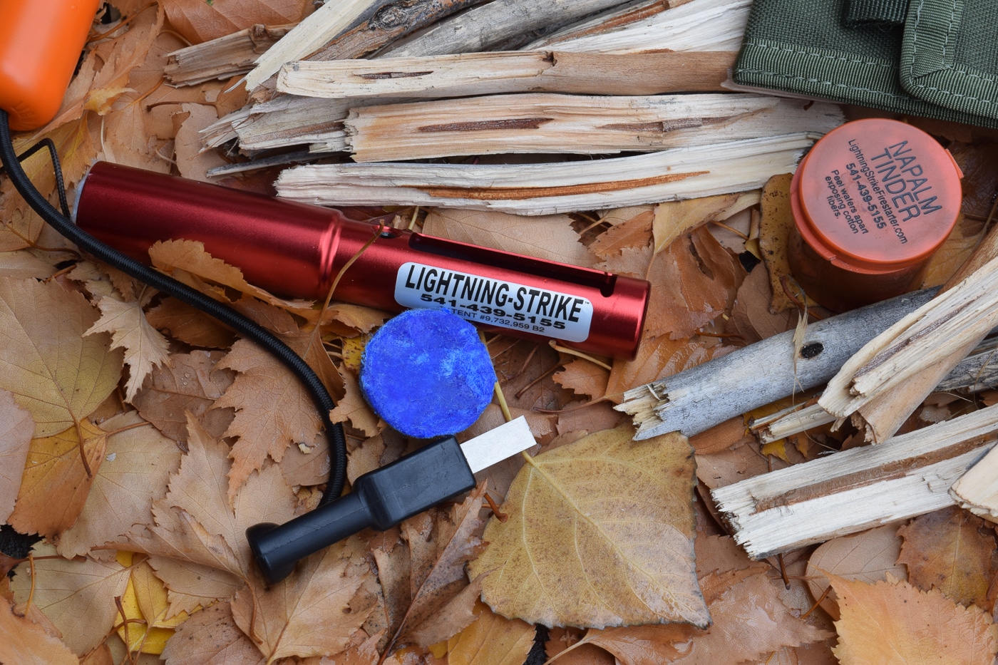 stack kindling and wood before igniting fire starter