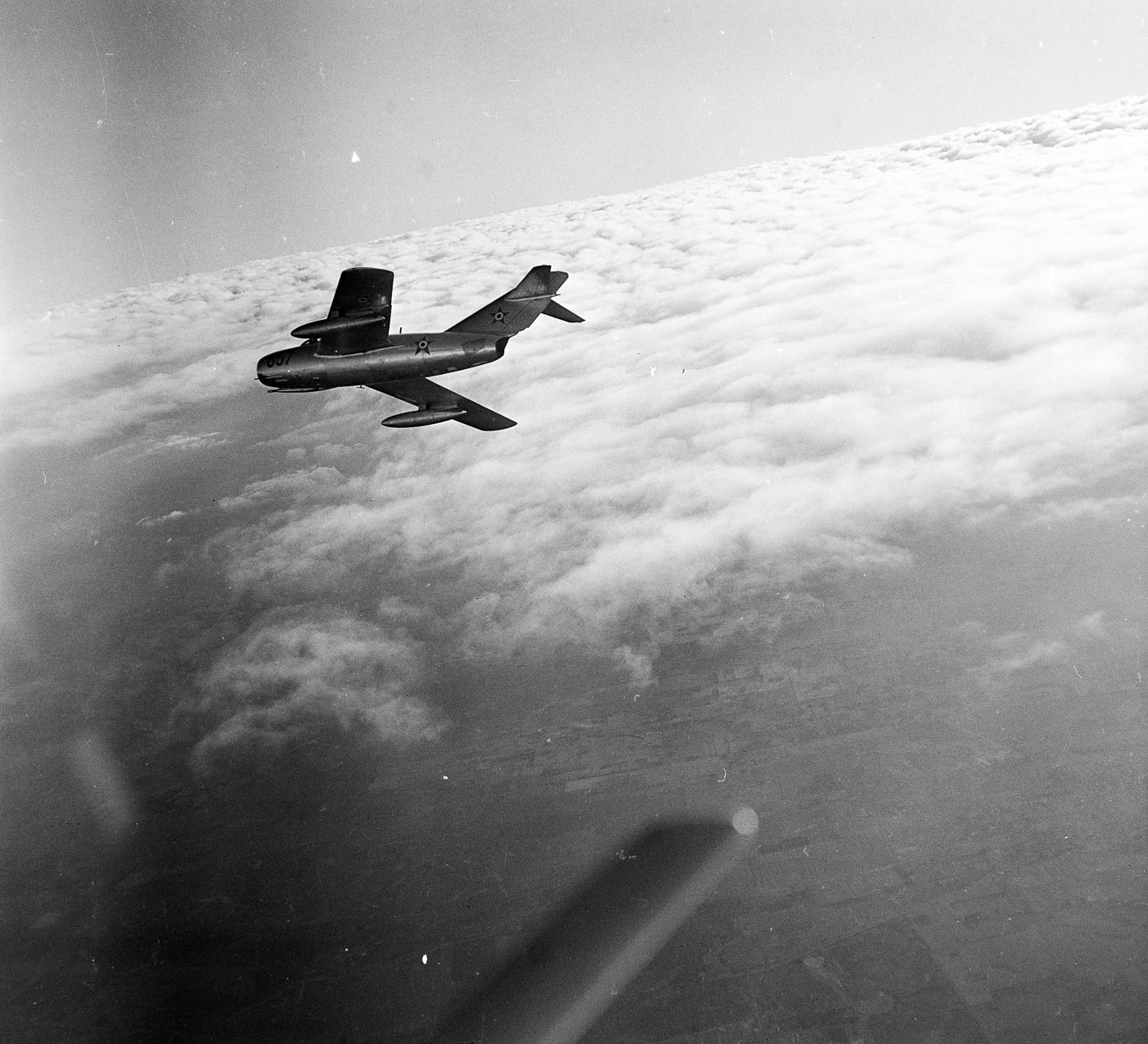 Hungarian Air Force MiG-15 banks right to expose its underside